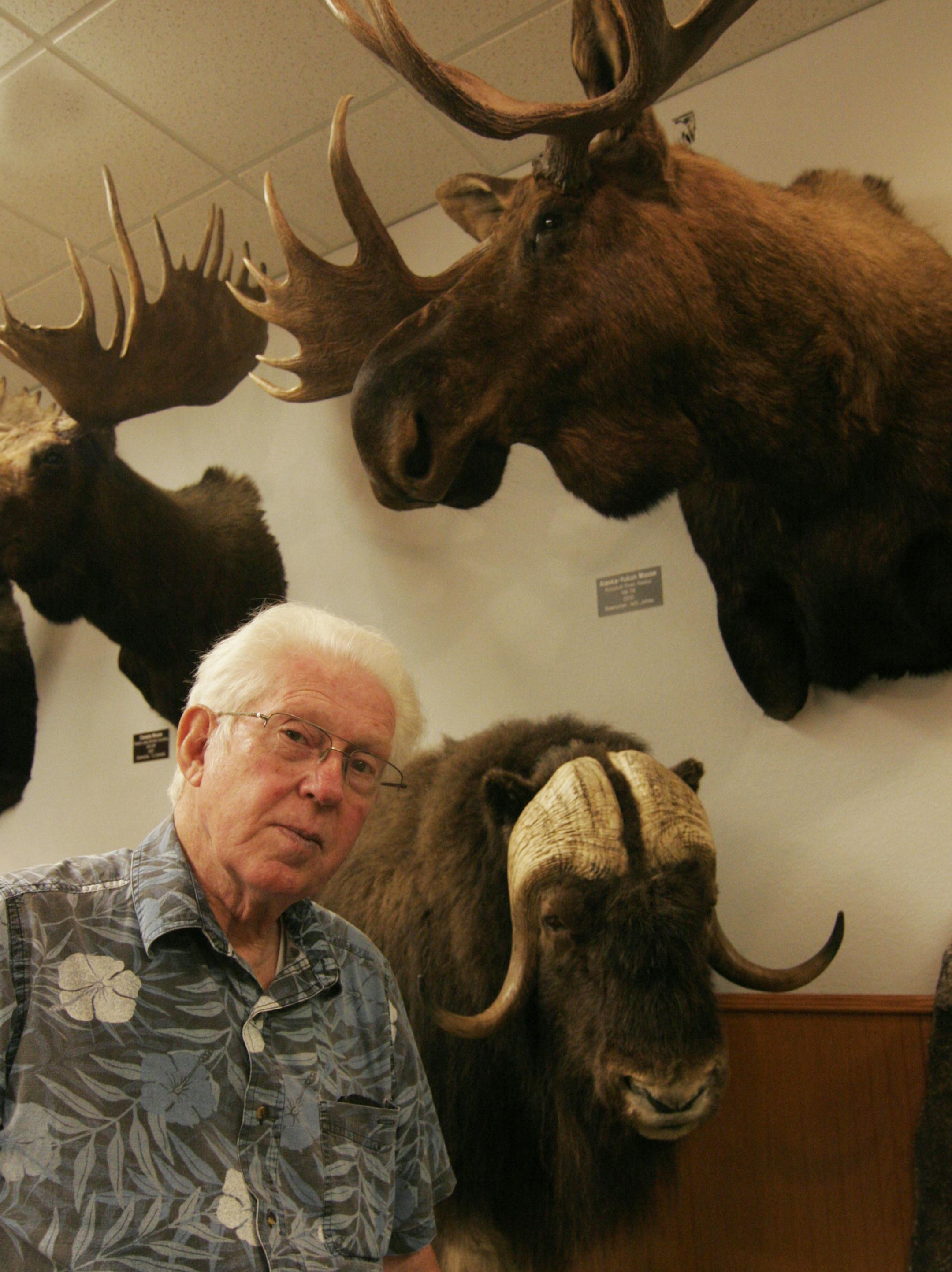 Glenn Hisey, executive secretary and director of the Pope and Young Club Museum in Chatfield, Minn., along with some of the 29 North American big game species on display. Star Tribune photo by Doug Smith