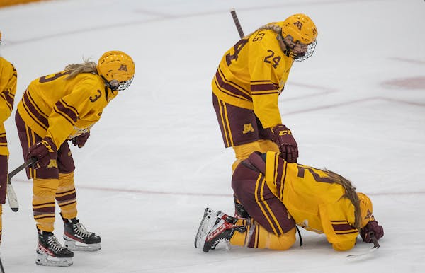 The Minnesota Gophers react to their 2-1 loss to Duluth at Ridder Arena, in Minneapolis, Minn., on Saturday, March 12, 2022. The Gophers women's hocke