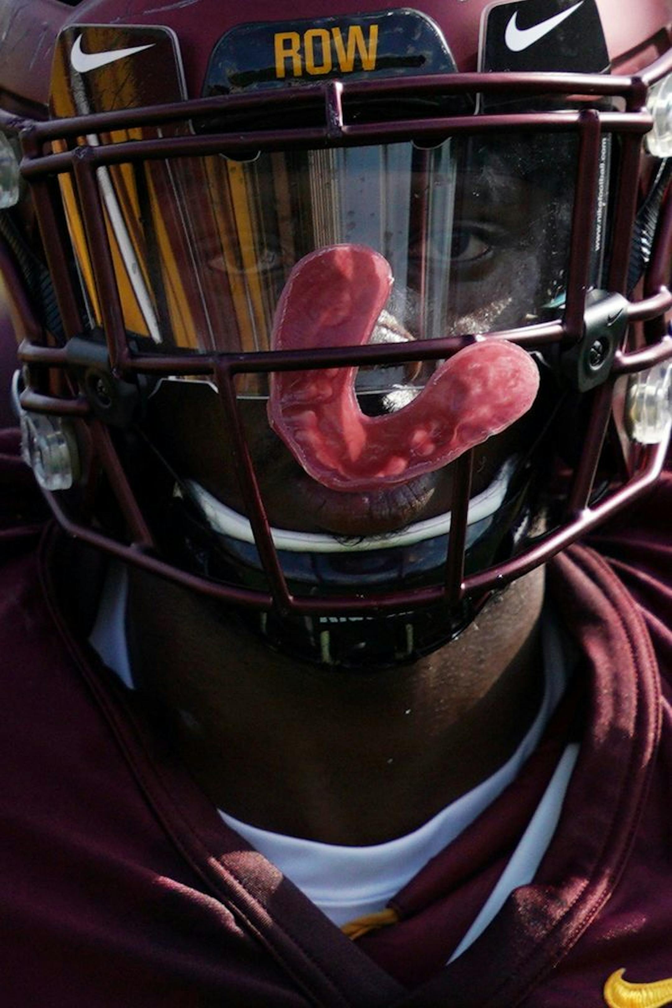 Minnesota Golden Gophers defensive end Tai'yon Devers (12) worked out with his teammates during practice Friday.