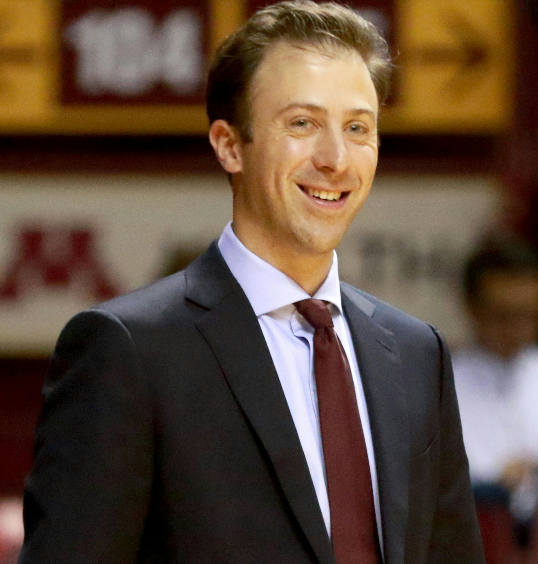 University of Minnesota coach Richard Pitino flashes a smile after watching new player Akeem Springs go three for his first three shots against La.-Lafayette Friday, Nov. 11, 2016, during the first half at Williams Arena on the University of Minnesota campus in Minneapolis, MN. (DAVID JOLES/STARTRIBUNE)djoles@startribune.com Gophers game vs. La.-Lafayette