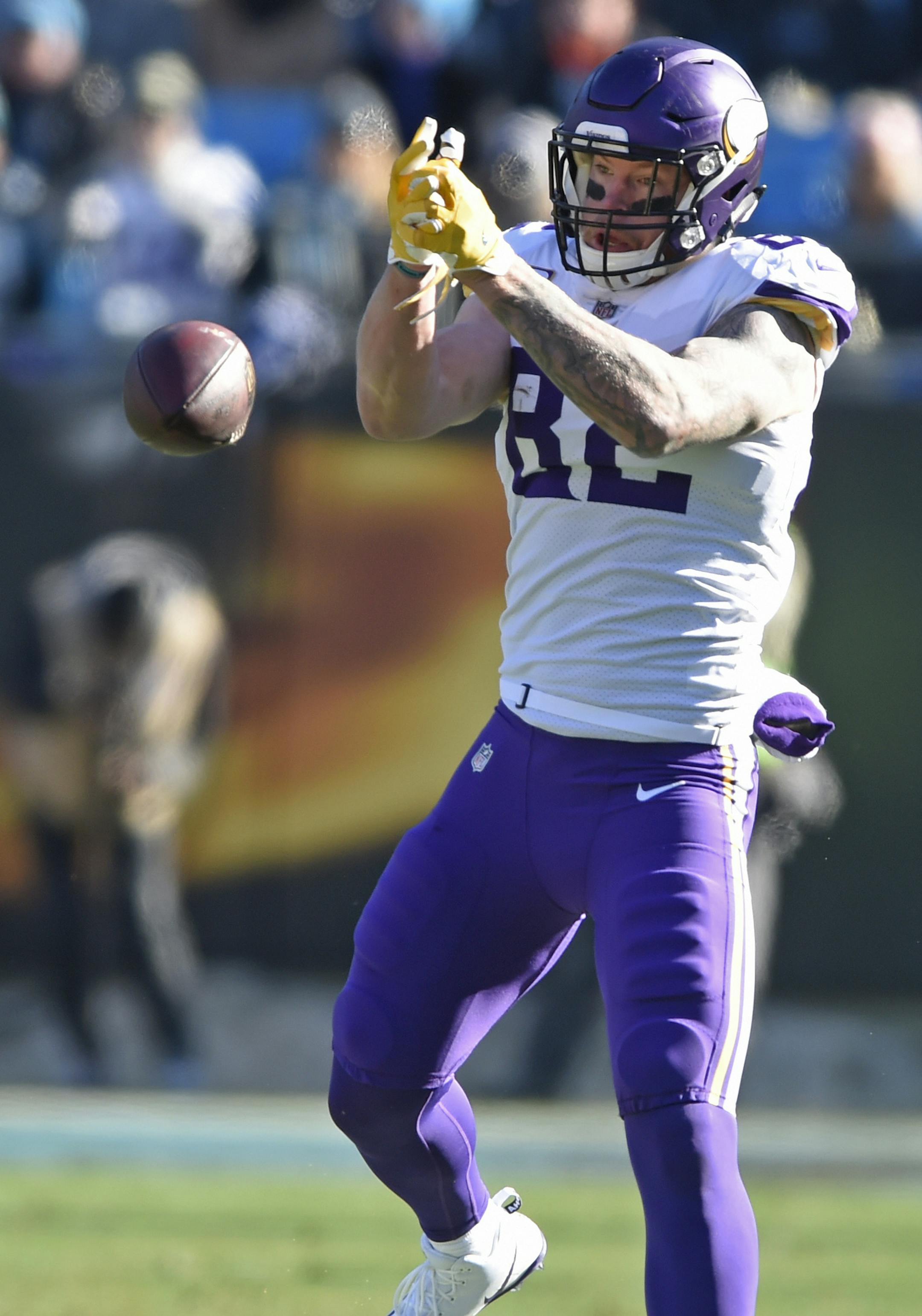 Minnesota Vikings' Kyle Rudolph (82) misses a catch in front of Carolina Panthers' Thomas Davis (58) during the first half of an NFL football game in Charlotte, N.C., Sunday, Dec. 10, 2017. (AP Photo/Mike McCarn)