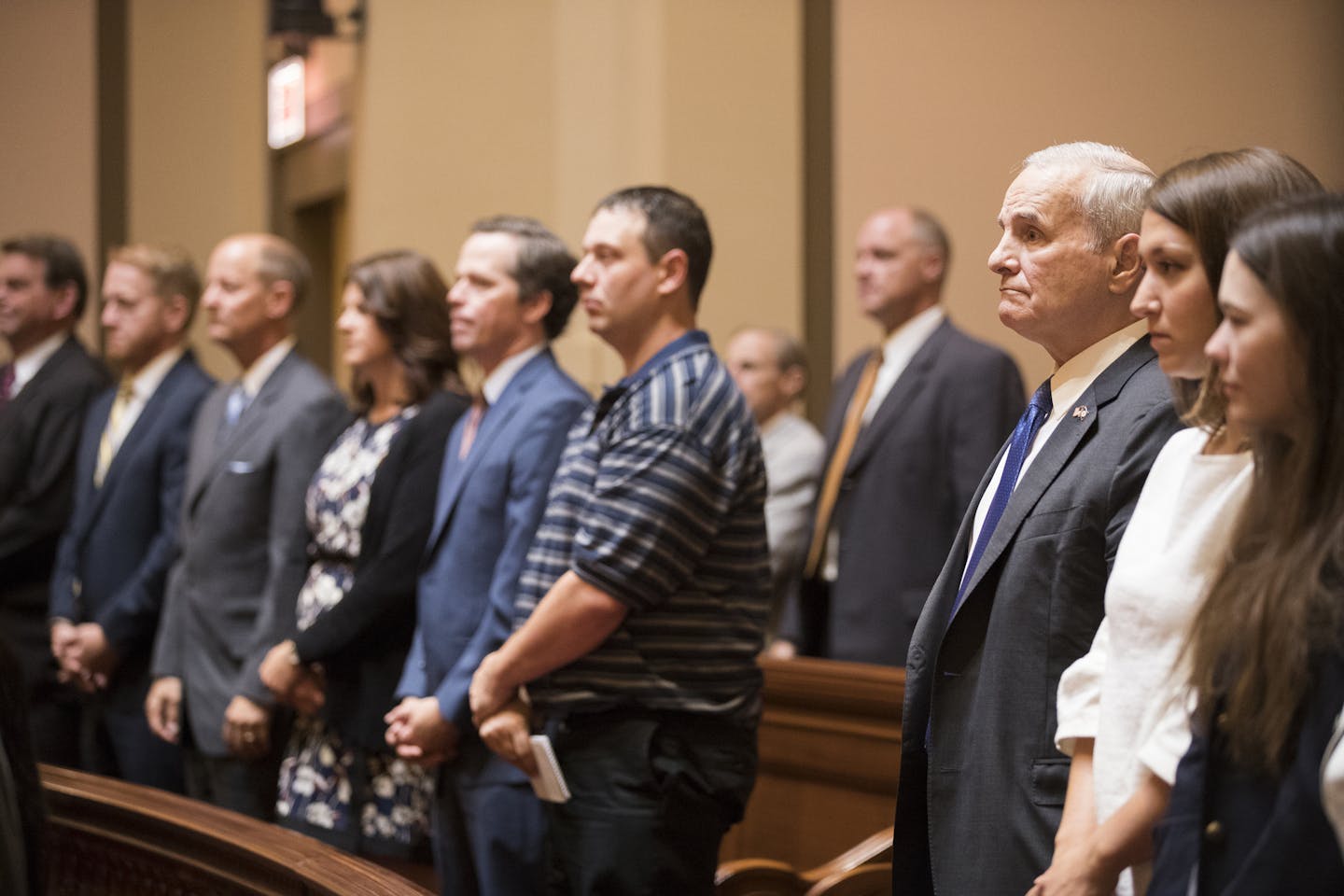 Gov. Mark Dayton, third from right, attends the Minnesota Supreme Court oral arguments at the Capitol in St. Paul on Aug. 28.