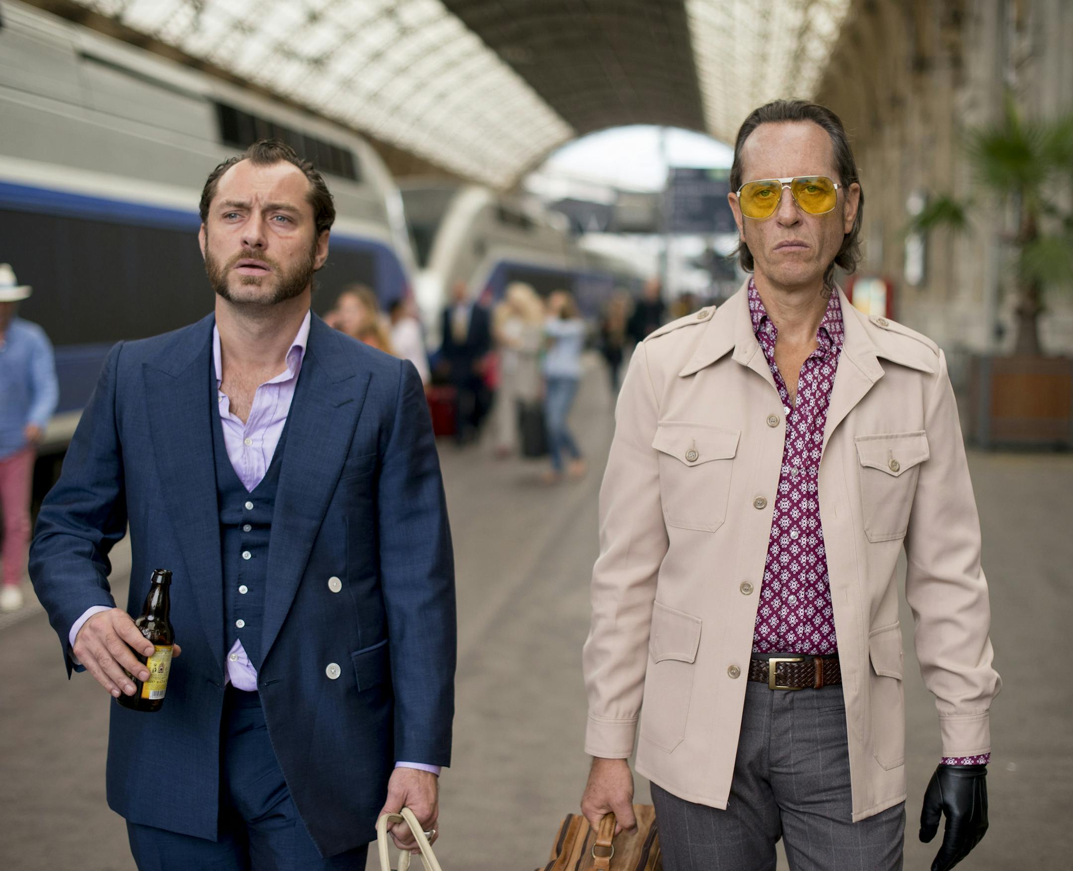This image released by Fox Searchlight Pictures shows Jude Law, left, and Richard E. Grant in a scene from "Dom Hemingway." (AP Photo/Fox Searchlight Pictures, Nick Wall)