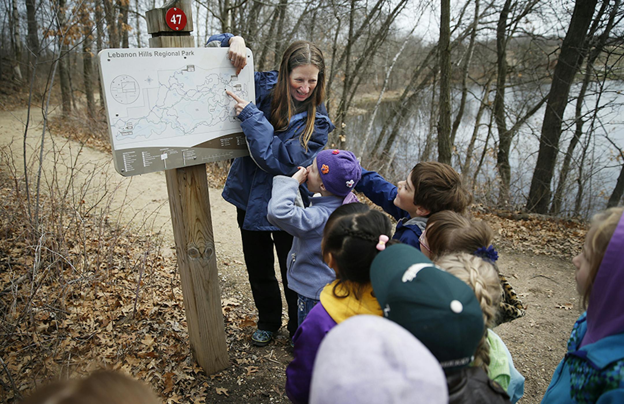 At the Lebanon Hills Regional Park, Amy Forslund, a park naturalist lead a birthday party of 13 children on the "Discovery Trail" section of the park pointing out the way back to headquarters. ]rtsong-taatarii@startribune.com ORG XMIT: MIN1305051603261344
