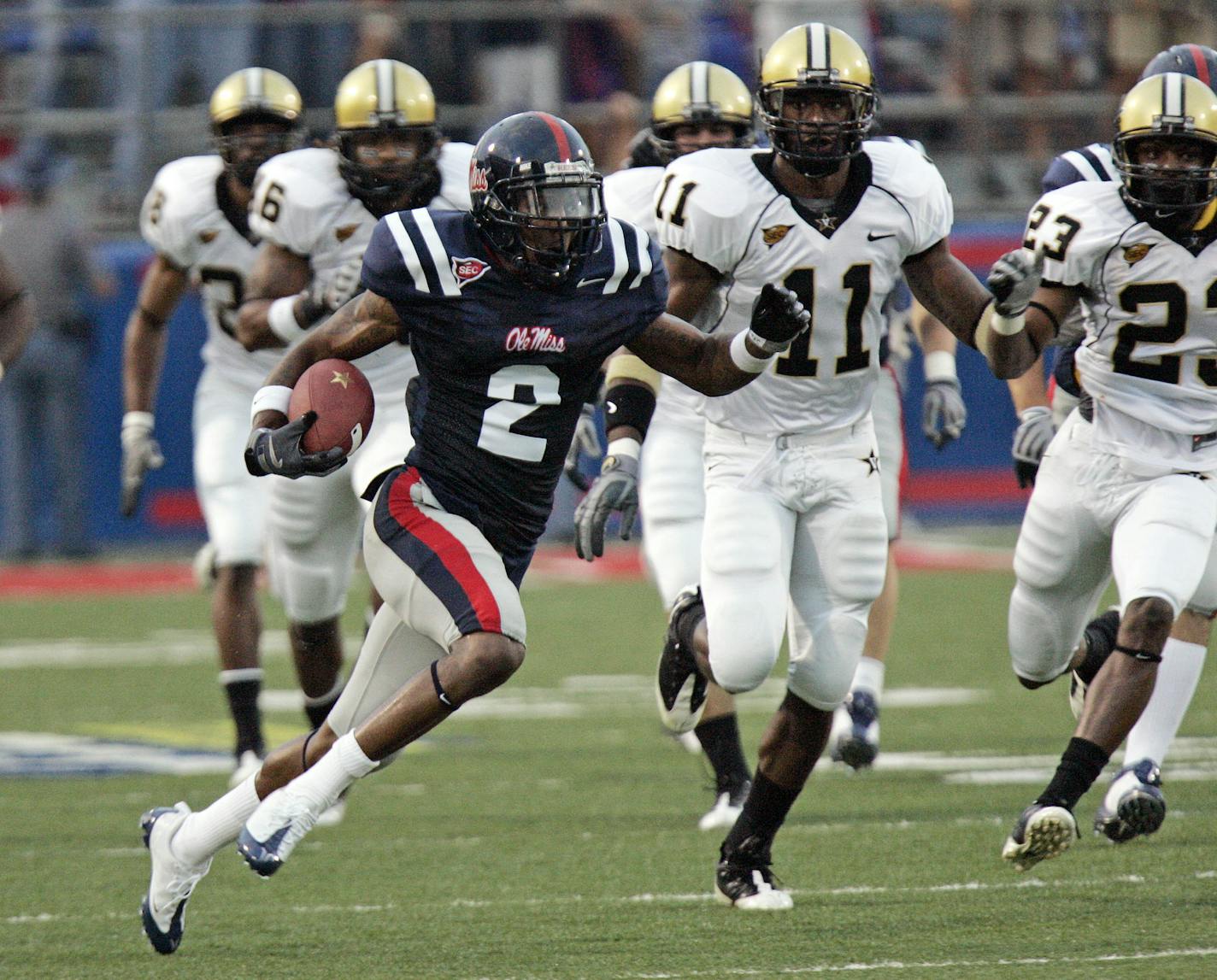 Mississippi wide receiver Mike Wallace (2) returns a first quarter kickoff 98-yards for a touchdown against Vanderbilt during their NCAA college football game Saturday evening, Sept. 20, 2008, in Oxford, Miss. (AP Photo/Rogelio V. Solis) ORG XMIT: MSRS101