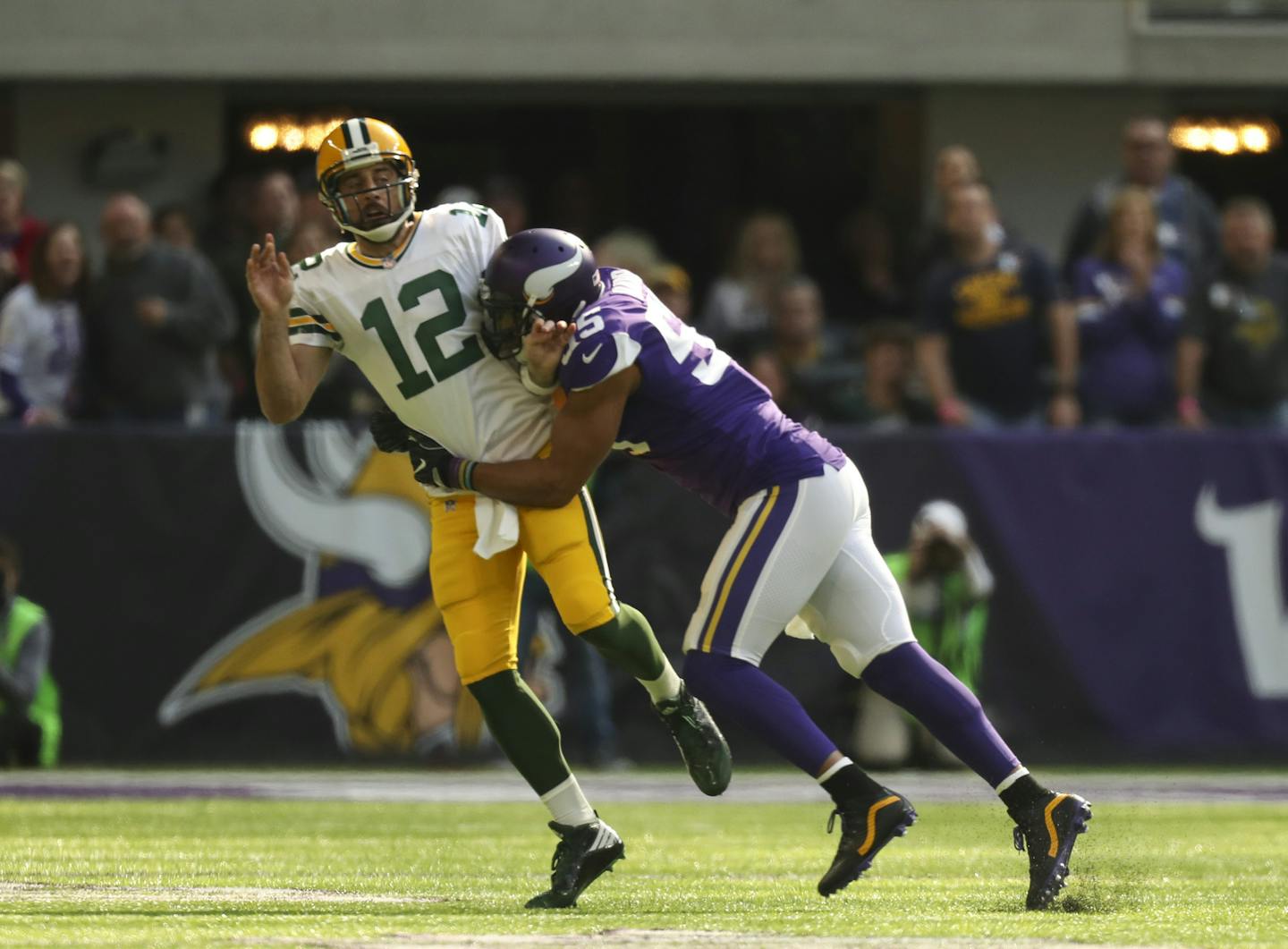 Green Bay Packers quarterback Aaron Rodgers (12) left the game after a hit on this play by Minnesota Vikings outside linebacker Anthony Barr (55) in the first quarter. ] JEFF WHEELER &#xef; jeff.wheeler@startribune.com The Minnesota Vikings met the Green Bay Packers in an NFL football game Sunday afternoon, October 15, 2017 at U.S. Bank Stadium in Minneapolis. ORG XMIT: MIN1710151607361673