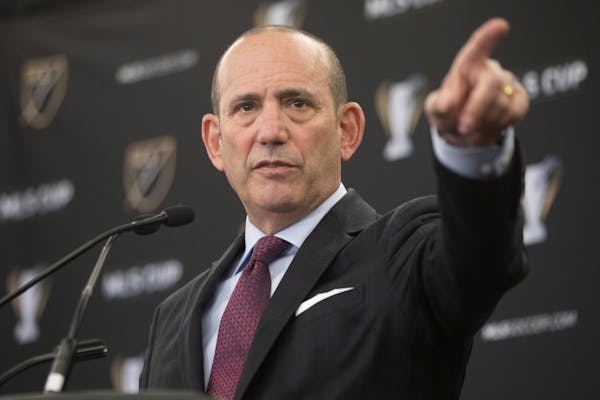 FILE - This Dec. 9, 2016 file photo shows MLS Commissioner Don Garber holding a state of the league news conference in Toronto. St. Louis and San Dieg