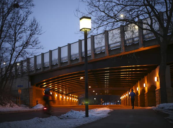 A streetlight on Minnehaha Parkway near an I-35W overpass earlier this month. LED lights can be seen illuminating the freeway.