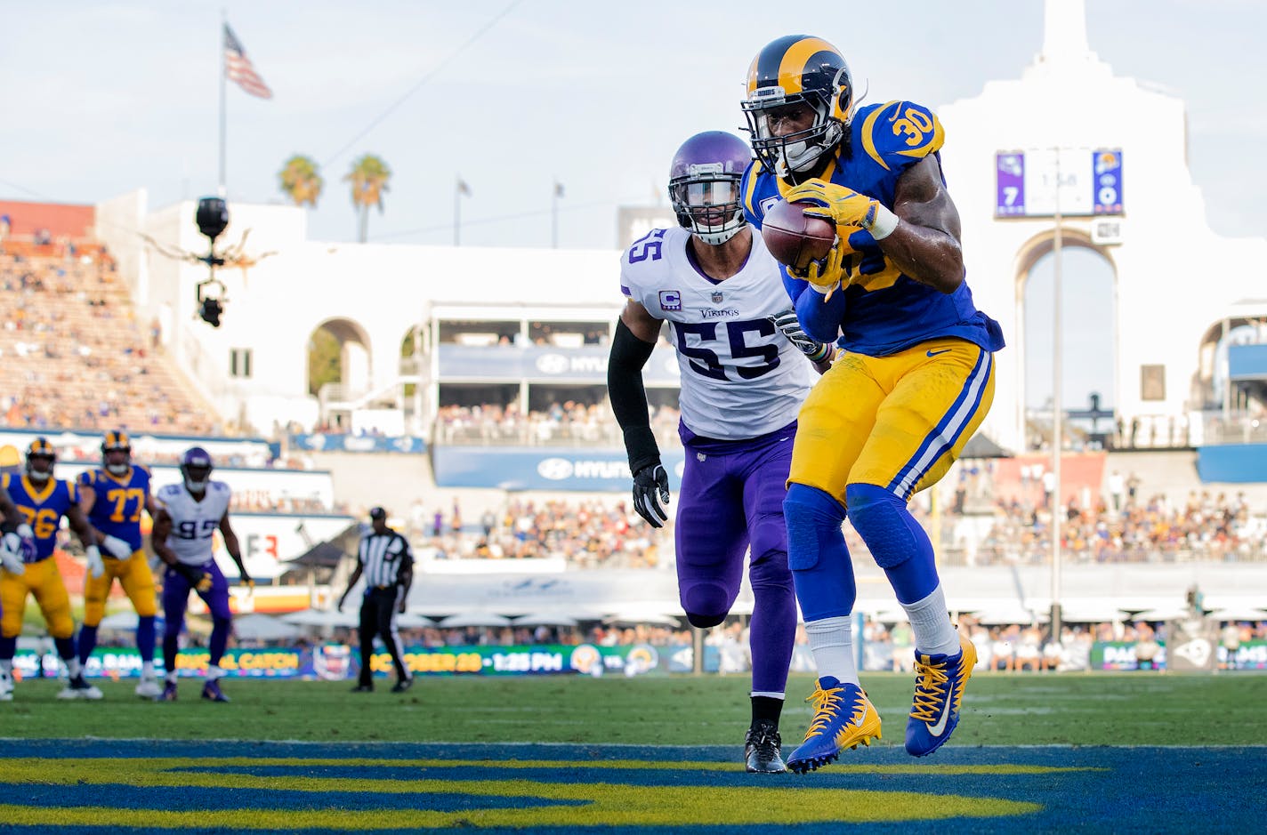 With Anthony Barr (55) trailing, Todd Gurley caught an 8-yard TD pass in the first quarter, the start of a rough day for Barr.