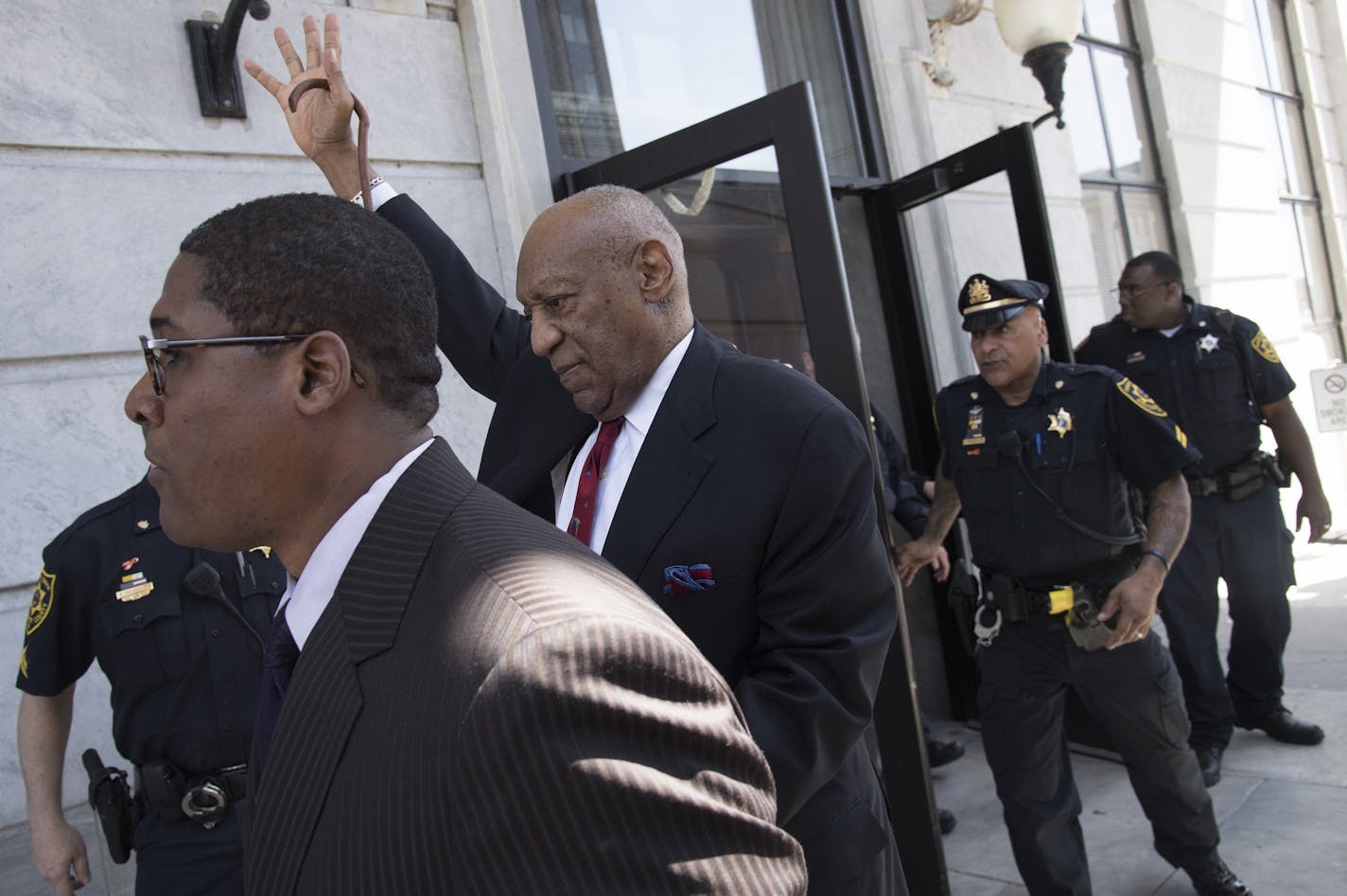 Bill Cosby leaves the courtroom after he was found guilty following his sexual assault trial on Thursday, April 26, 2018, at the Montgomery County Courthouse in Norristown, Pa.