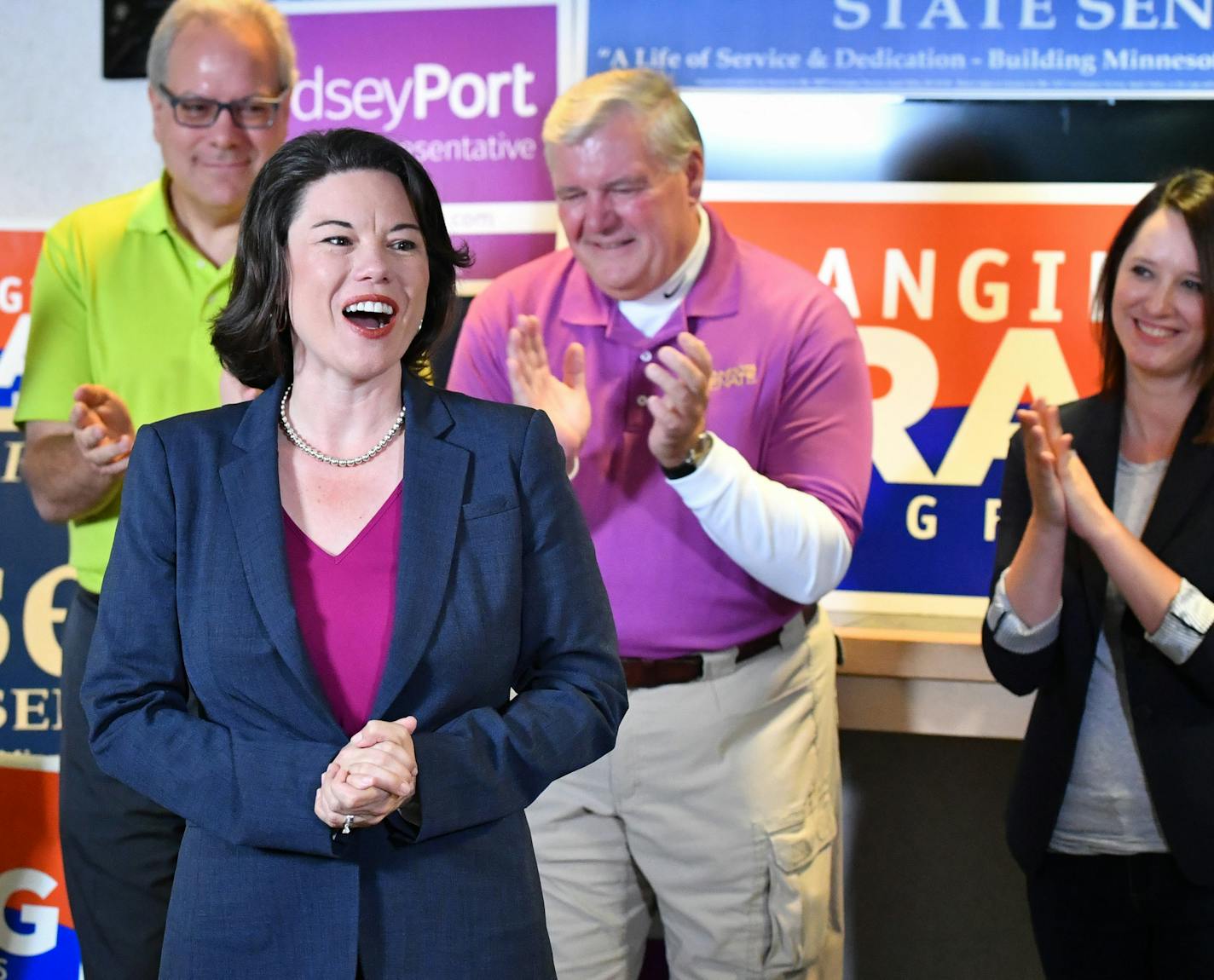 Angie Craig was cheered by other DFL local candidates at the Apple Valley DFL field office rally. Behind her are candidates John Huot, Phillip Sterner, Sen. Greg Clausen and Lindsey Port.