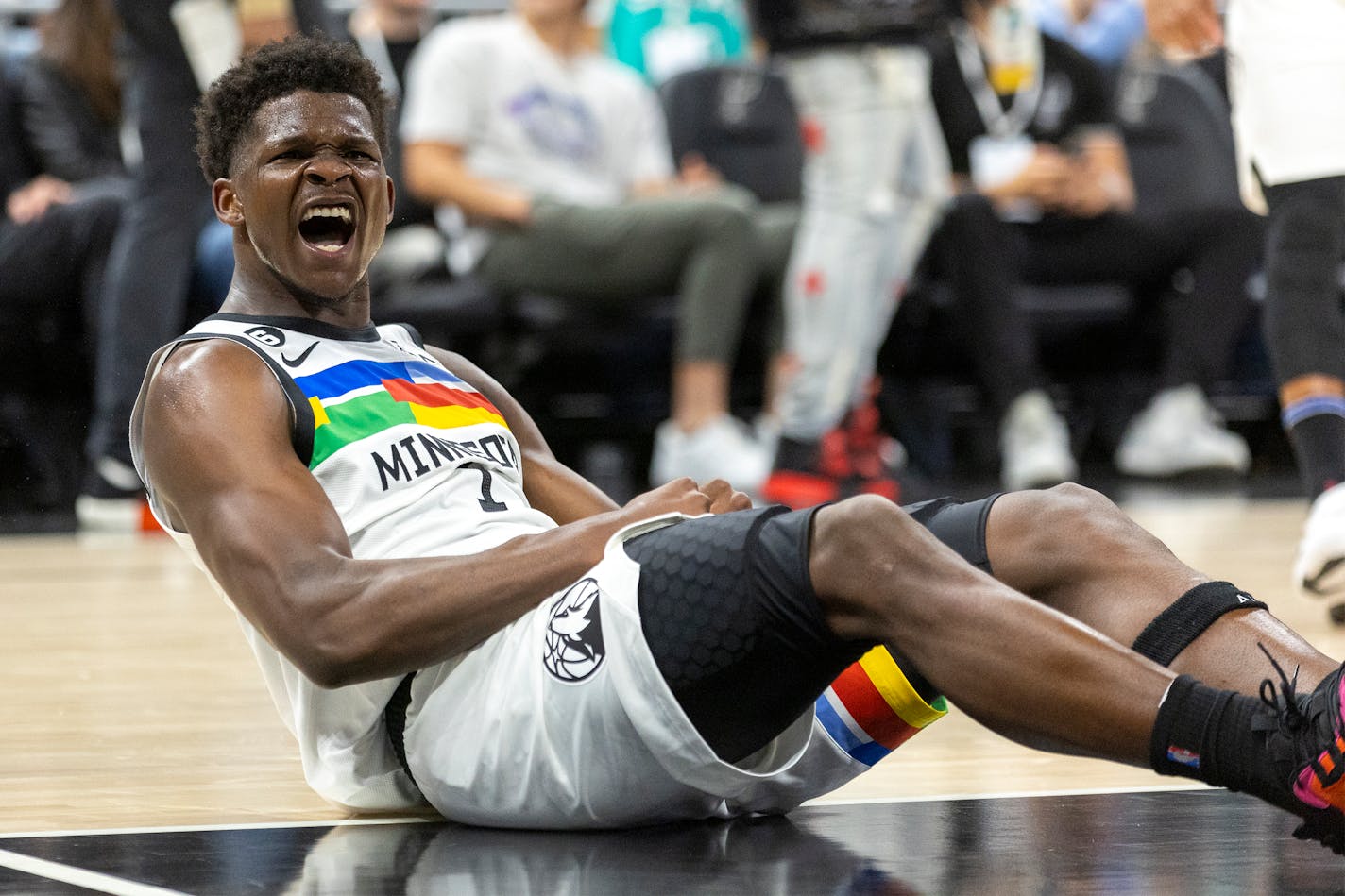 Minnesota Timberwolves guard Anthony Edwards celebrates after scoring against the San Antonio Spurs during the first half of an NBA basketball game, Saturday, April 8, 2023, in Austin, Texas. (AP Photo/Stephen Spillman)