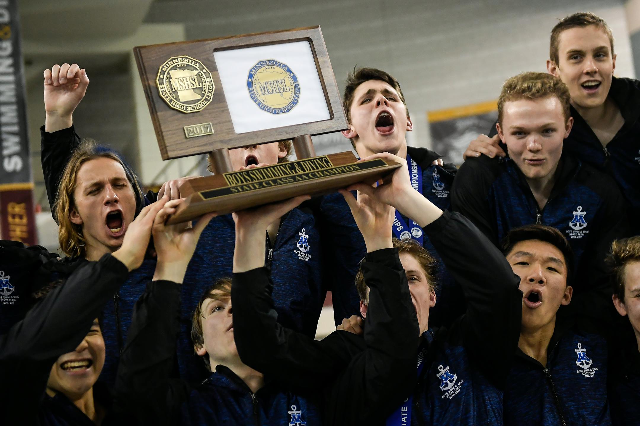 The Minnetonka boys' swim team celebrated the team title last season.