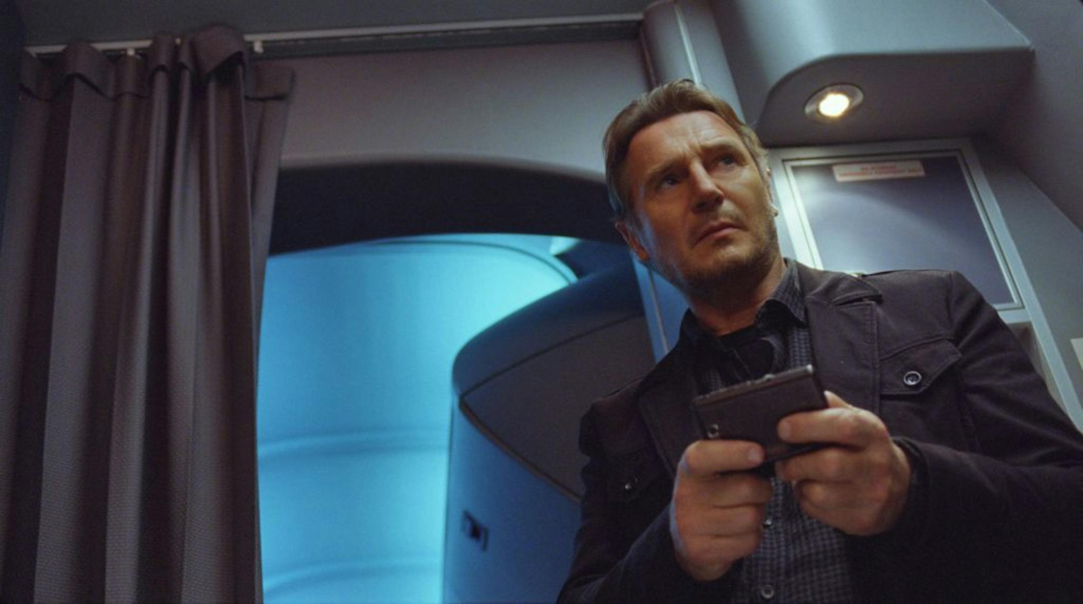 This image released by Universal Pictures shows Liam Neeson in a scene from "Non-Stop." (AP Photo/Universal Pictures) ORG XMIT: MIN2014022615520802
