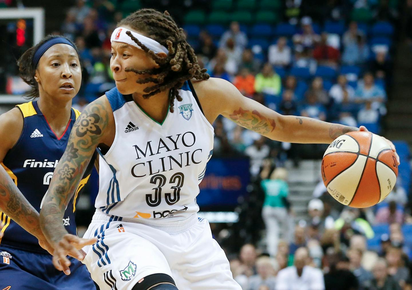 The Lynx's Seimone Augustus drove around Indiana's Briann January in the second half in Game 1 of the WNBA Finals. Lynx coach Cheryl Reeve says the team has to get more out of stars Augustus and Lindsay Whalen on offense as the finals progress. The Lynx trail the Indiana Fever 1-0 in the best-of-five series.