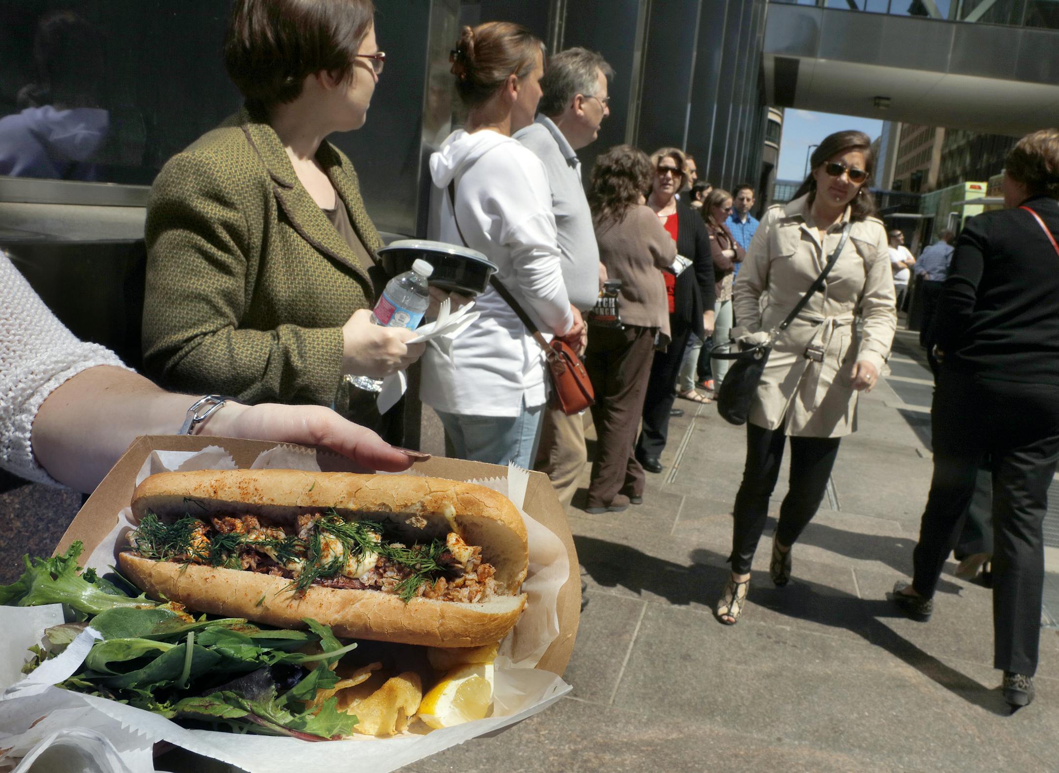 It was standing-room-only during a recent lunch hour near food trucks in downtown Minneapolis.
