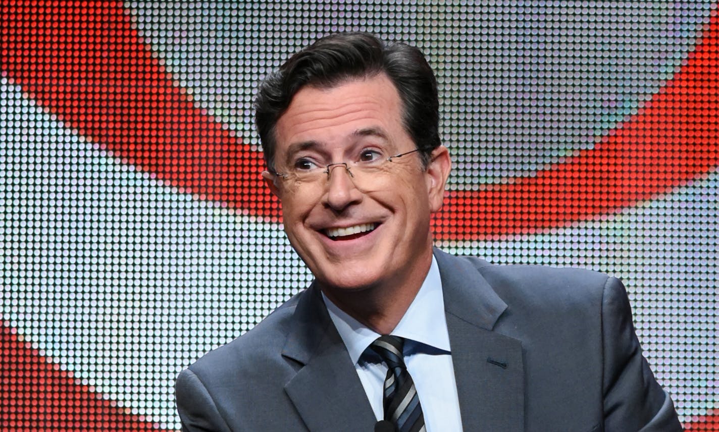 FILE - In this Aug. 10, 2015 file photo, Stephen Colbert participates in the "The Late Show with Stephen Colbert" segment of the CBS Summer TCA Tour in Beverly Hills, Calif. Colbert's debuts his show on Tuesday. (Photo by Richard Shotwell/Invision/AP, File)