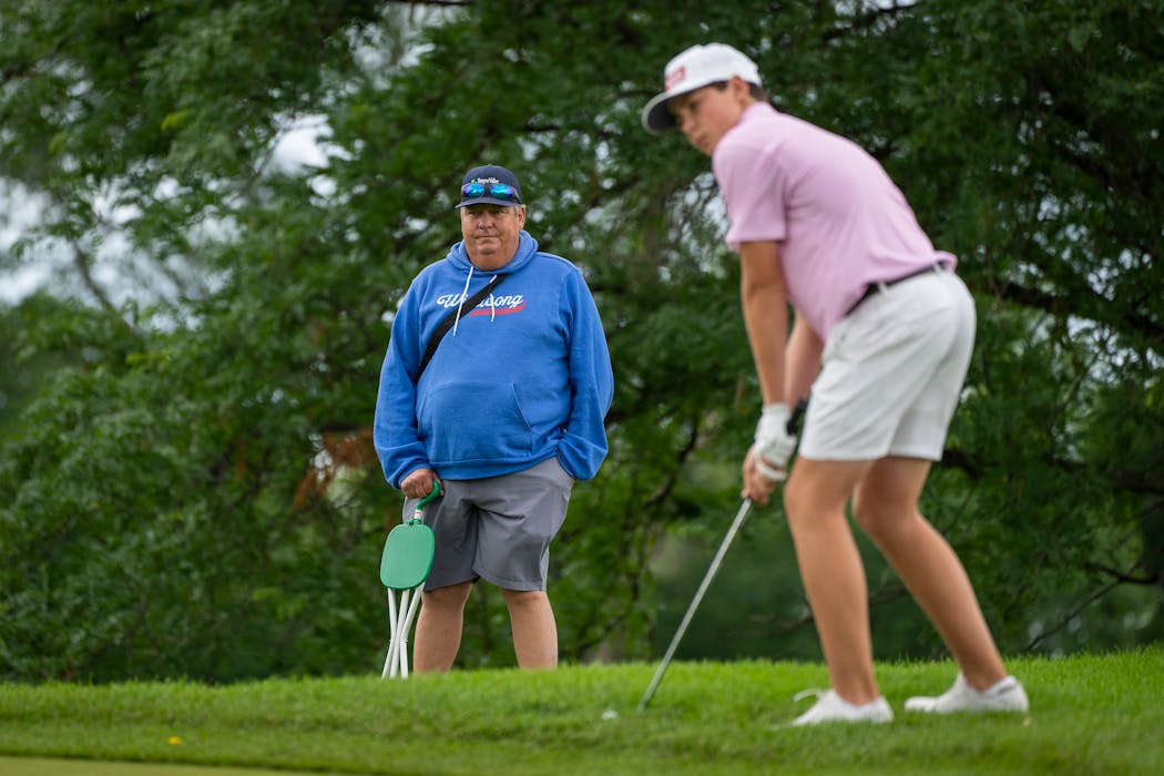 “I caddied for all three. Then I retired,” Tim Herron said about his sons. On Monday he watched Patrick line up a shot during the first round of the MGA State Amateur.