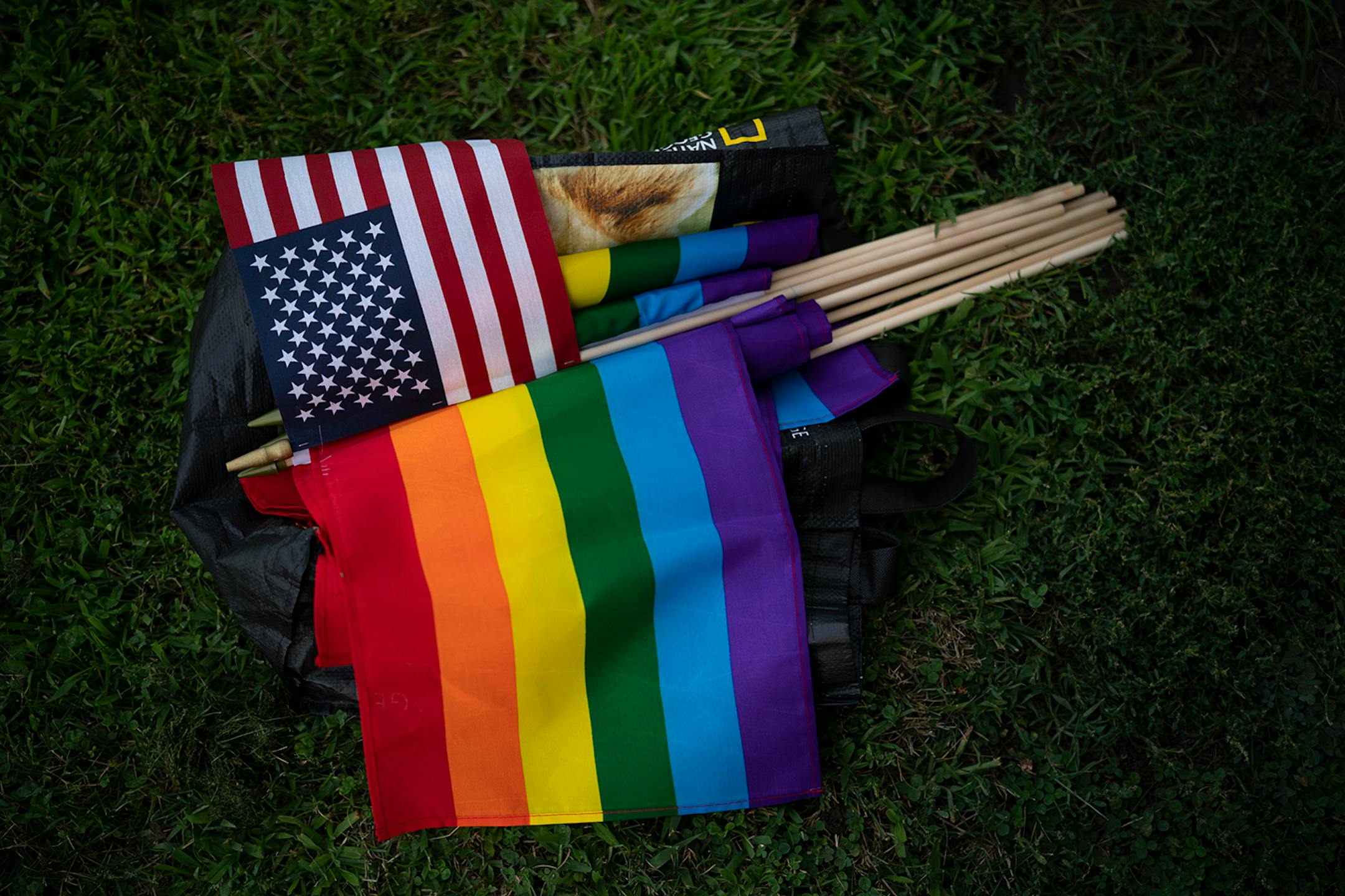 The social justice supporters had a supply of flags available for use by demonstrators.