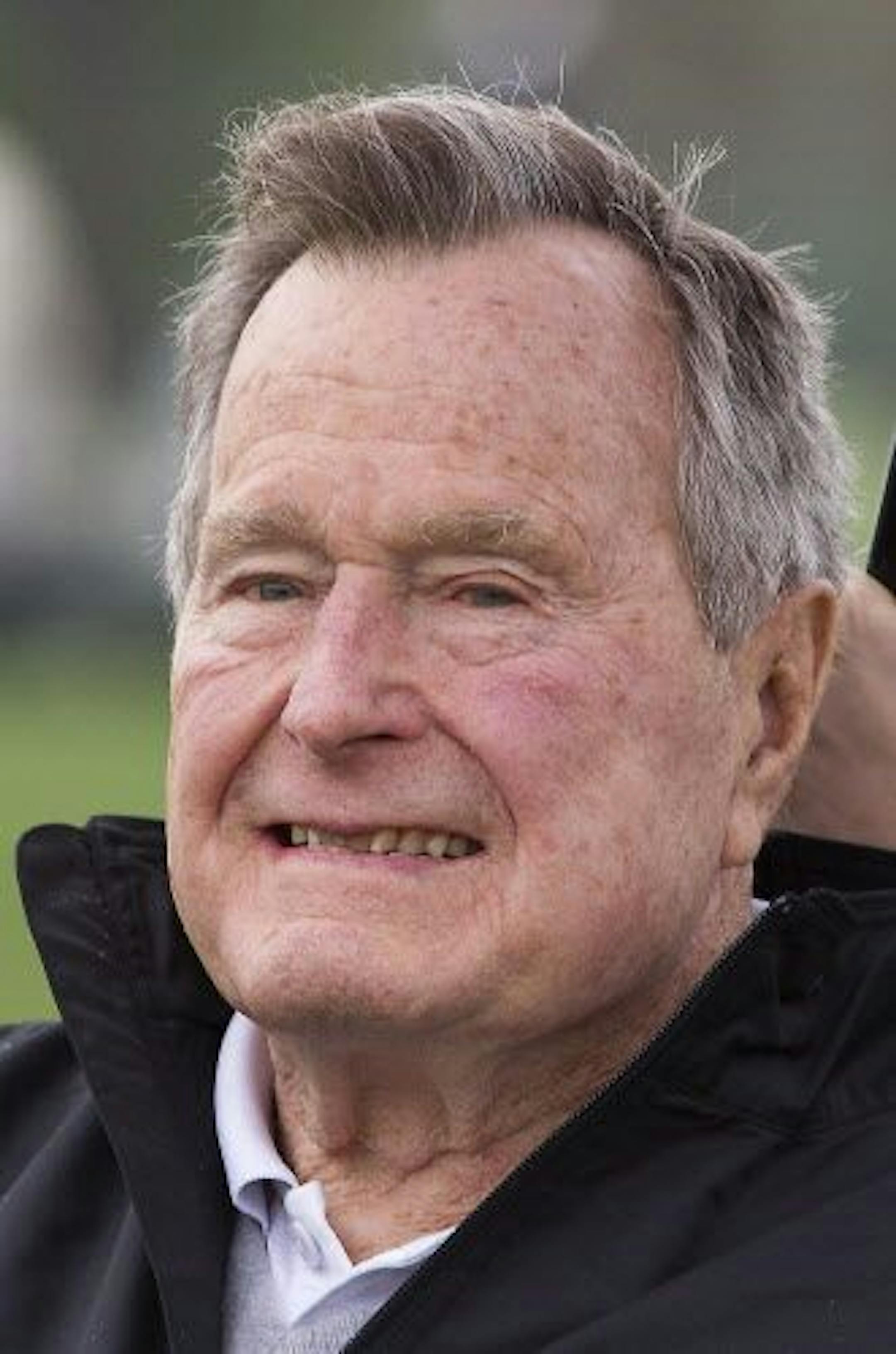Former President George H. W. Bush attends the final round of the Houston Open golf tournament, Sunday, April 6, 2014, in Humble, Texas.