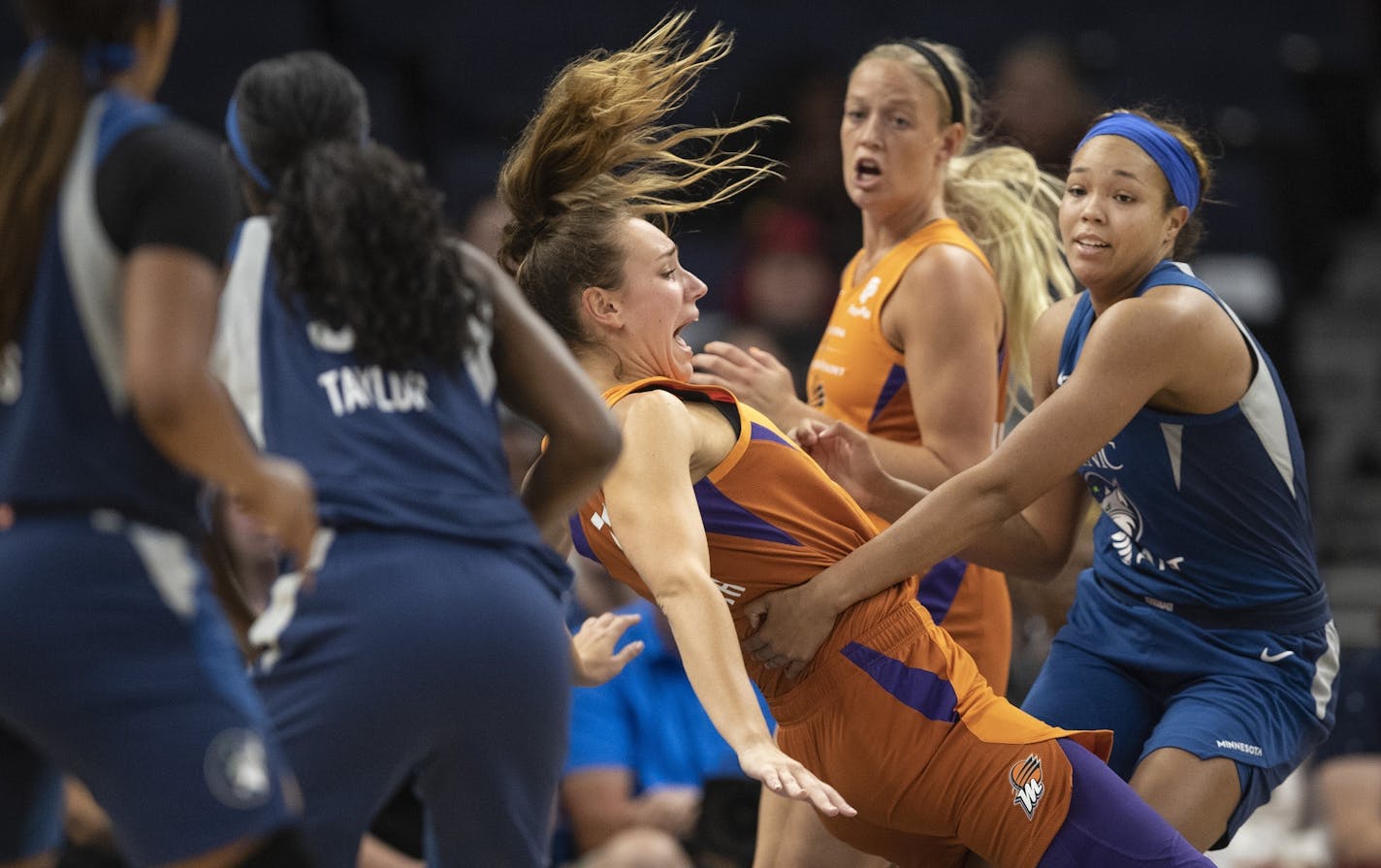 Minnesota Lynx forward Napheesa Collier (24) right tried to keep Phoenix Mercury forward Alanna Smith (11) from falling at Target Center Sunday July,14 2019 in Minneapolis, MN.