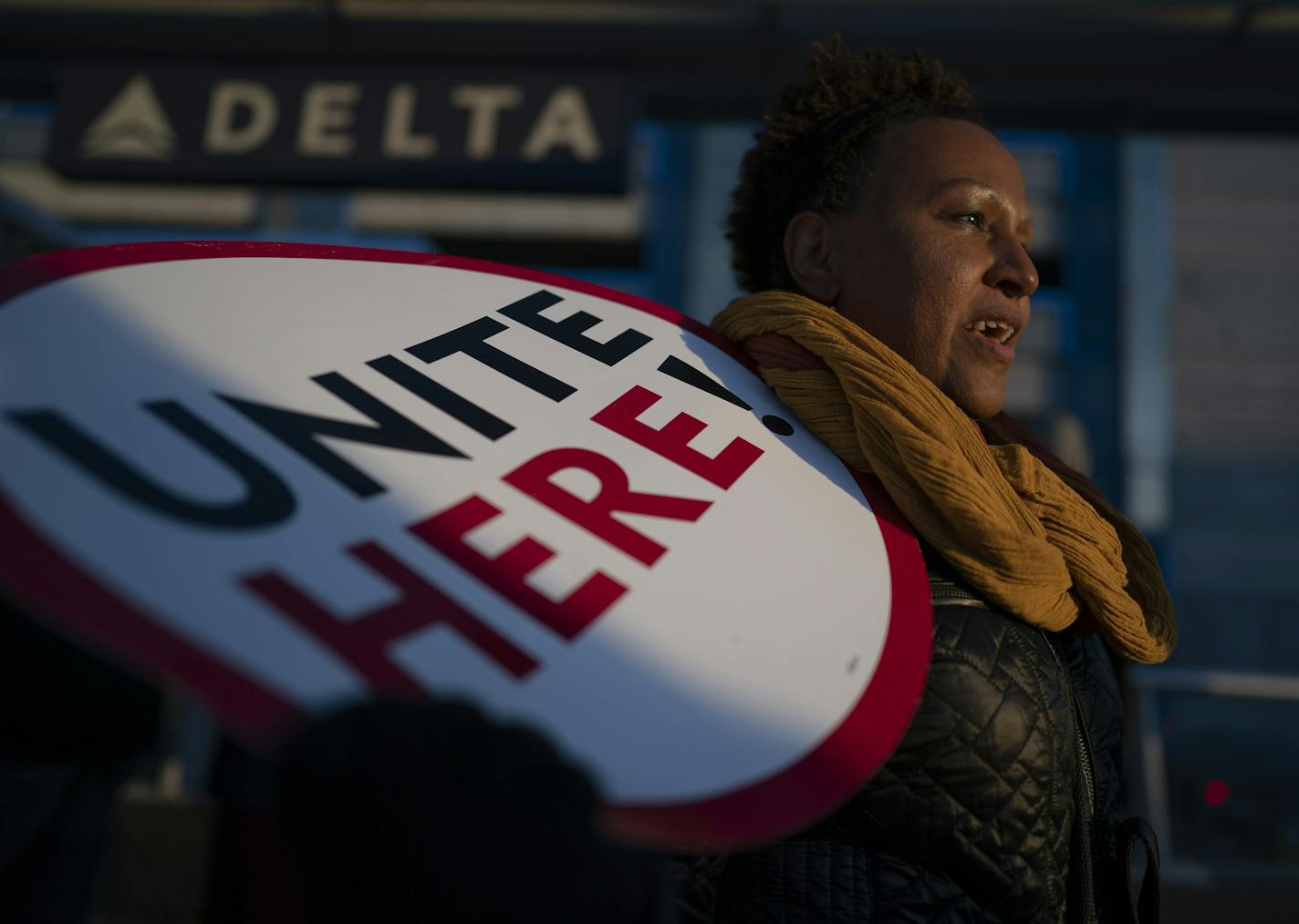 Feben Ghilagaber works as a server at a restaurant in the airport marched with other workers during a rally for a $15 minimum wage Thursday November 21, 2018 in Bloomington, MN.] Jerry Holt &#xef; Jerry.holt@startribune.com