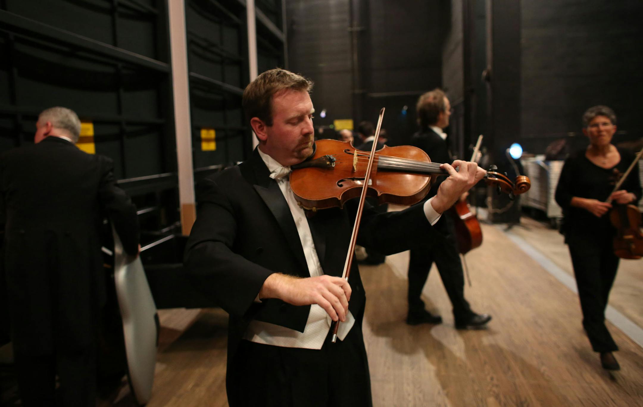 Viola player Sam Bergman warmed up backstage before a farewell concert at the Ted Mann Hall Min., Friday, October 4, 2013 ] (KYNDELL HARKNESS/STAR TRIBUNE) kyndell.harkness@startribune.com