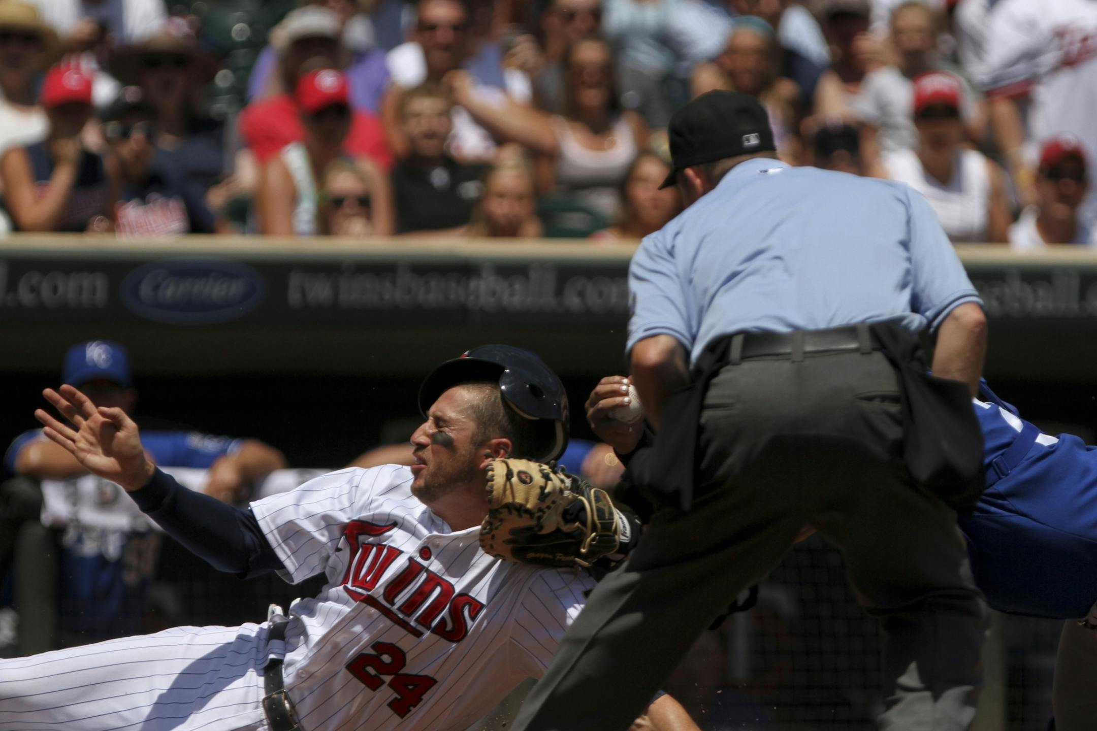During the Kansas City Royals vs. Minnesota Twins home game (game one), third baseman Trevor Plouffe slides into third in the bottom of the third inning in Target Field in Minneapolis, Minn. on Saturday, June 30, 2012.