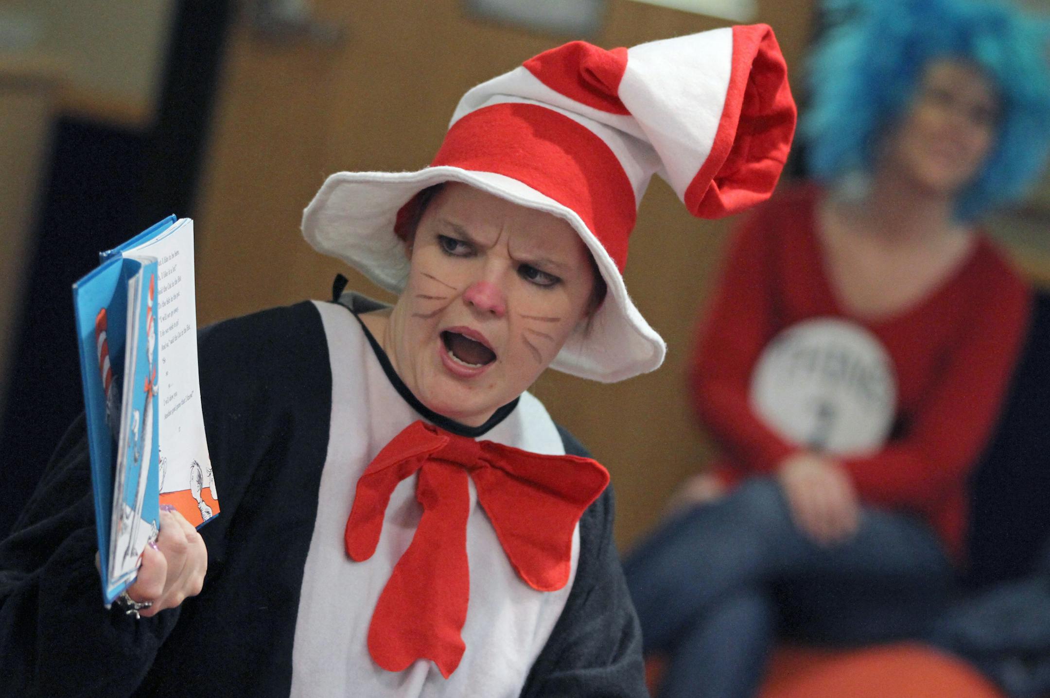 Kinderberry Hill staff member Mandy Blake was dressed as the Cat in the Hat as she read a Dr. Seuss book Friday to preschool students at Kinderberry Hill in downtown Minneapolis