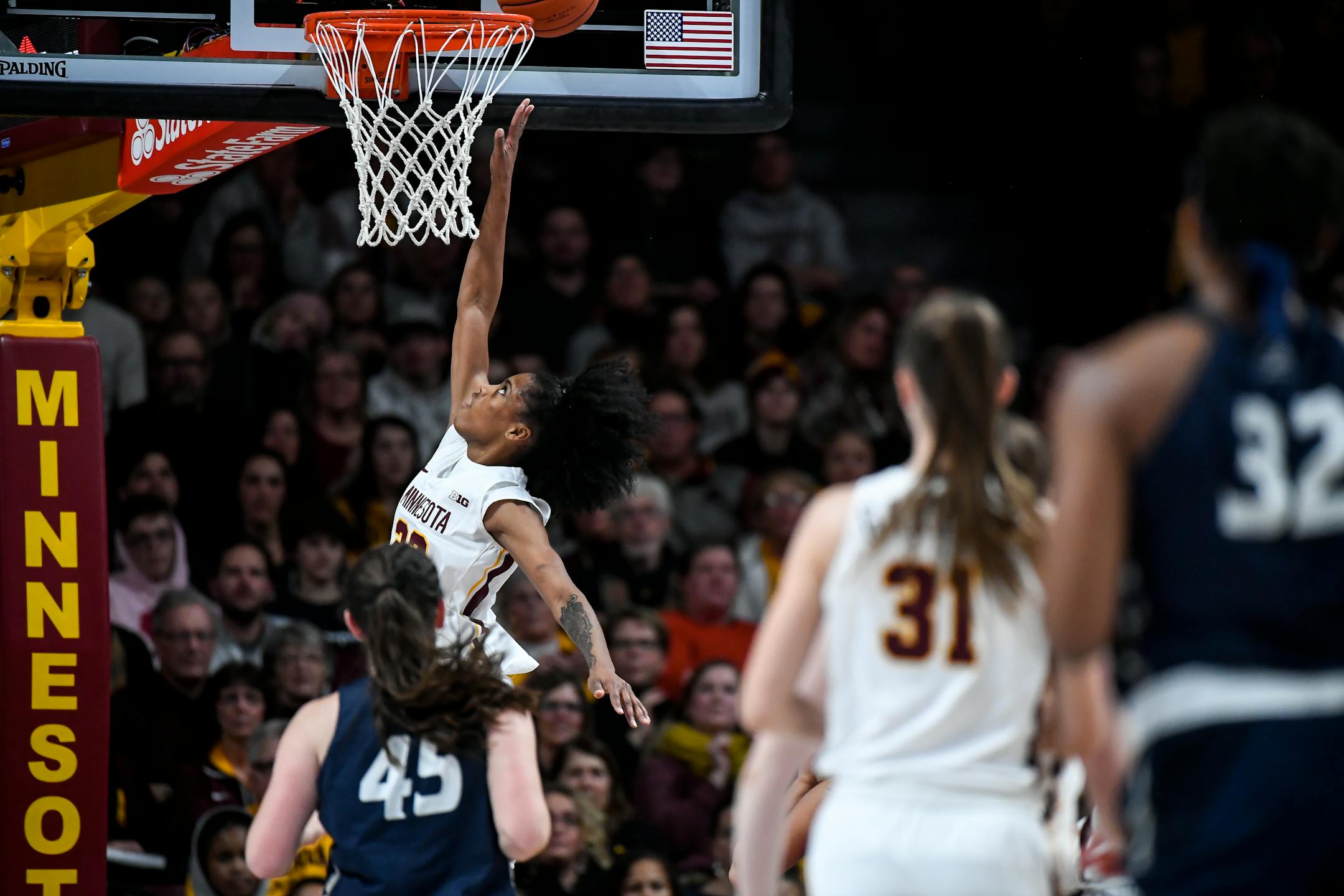 Gophers guard Kenisha Bell scored a layup in the second half against New Hampshire last week. The Gophers remained undefeated with a win over San Diego on Saturday.