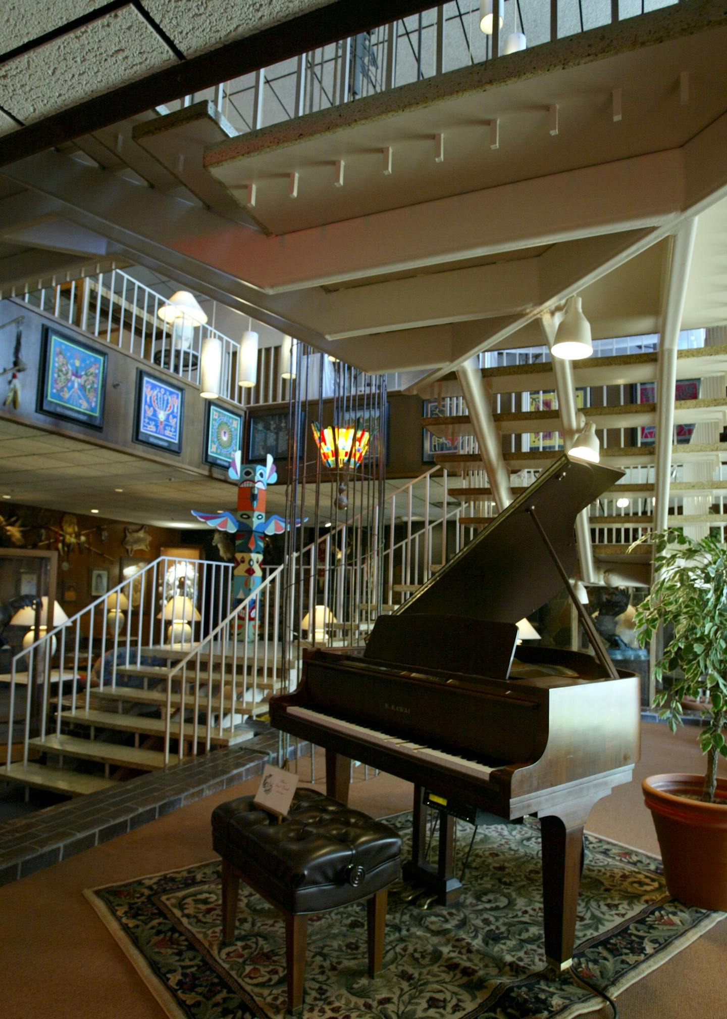 The interior lobby of the Thunderbird Motel, with its open staircase and lighting fixtures decending on cables, echoed a &#x2019;60s style.