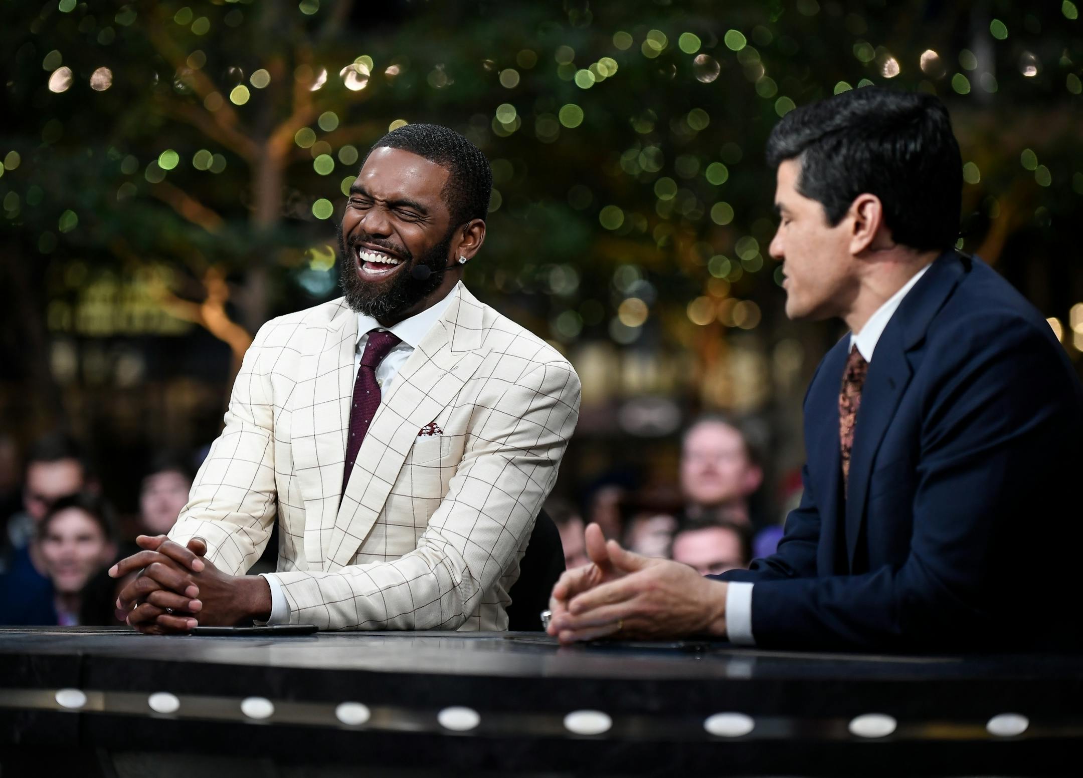 Former NFL wide receiver Randy Moss joked with former linebacker Tedy Bruschi Thursday during an appearance on Sports Center in the IDS Center.
