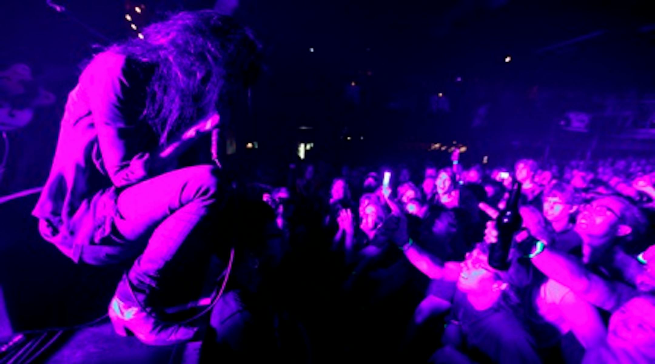 Fans reached out to singer Alison Mosshart at the Dead Weather show.