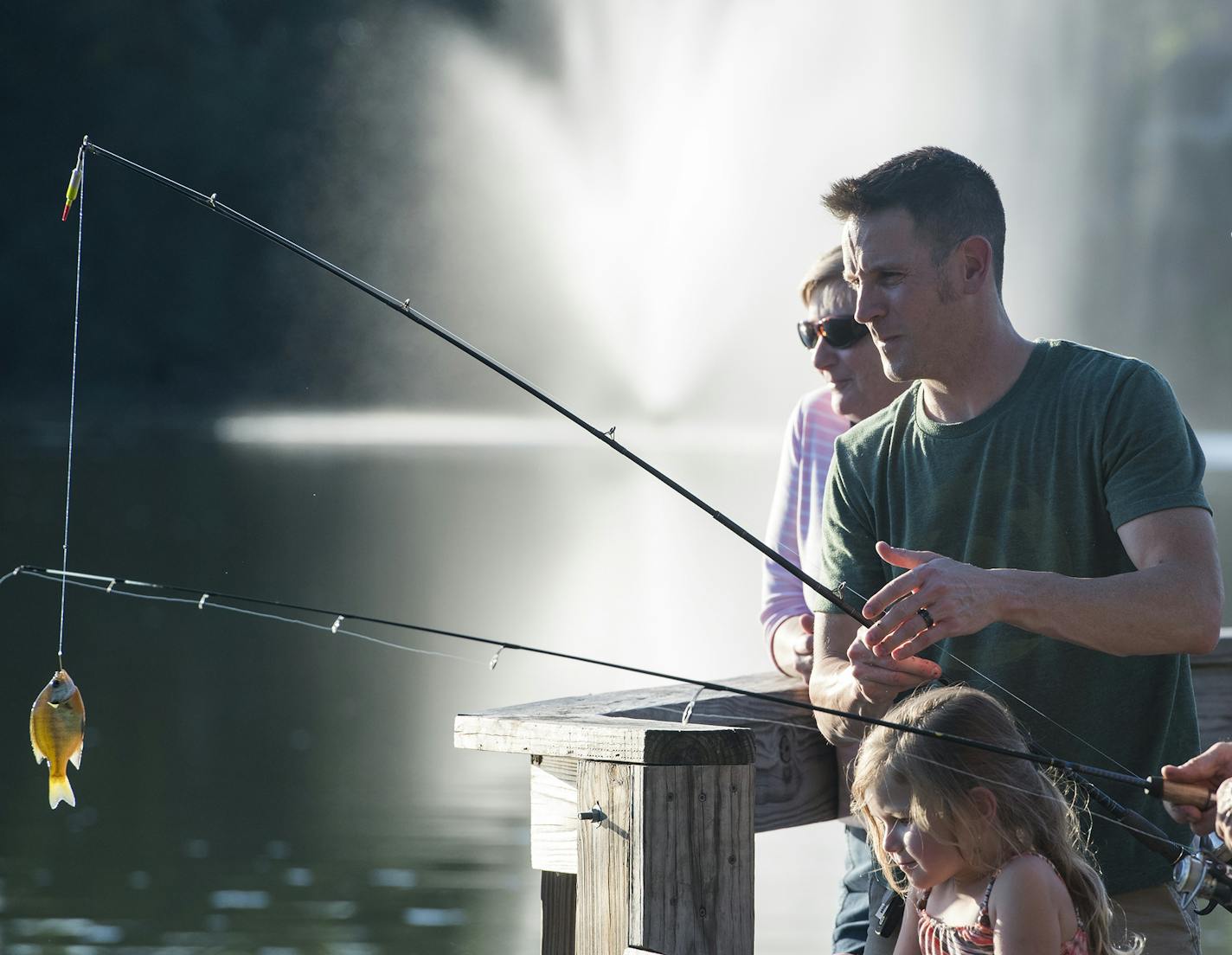 David Darr, in green, reeled in a fish as he fished with the rest of his family at Lagoon Park in Jordan. ] Isaac Hale &#xef; isaac.hale@startribune.com Though the population of Jordan, MN, has doubled in recent years, it still retains its small-town feel. People around the city enjoyed a typical Monday on July 18, 2016.