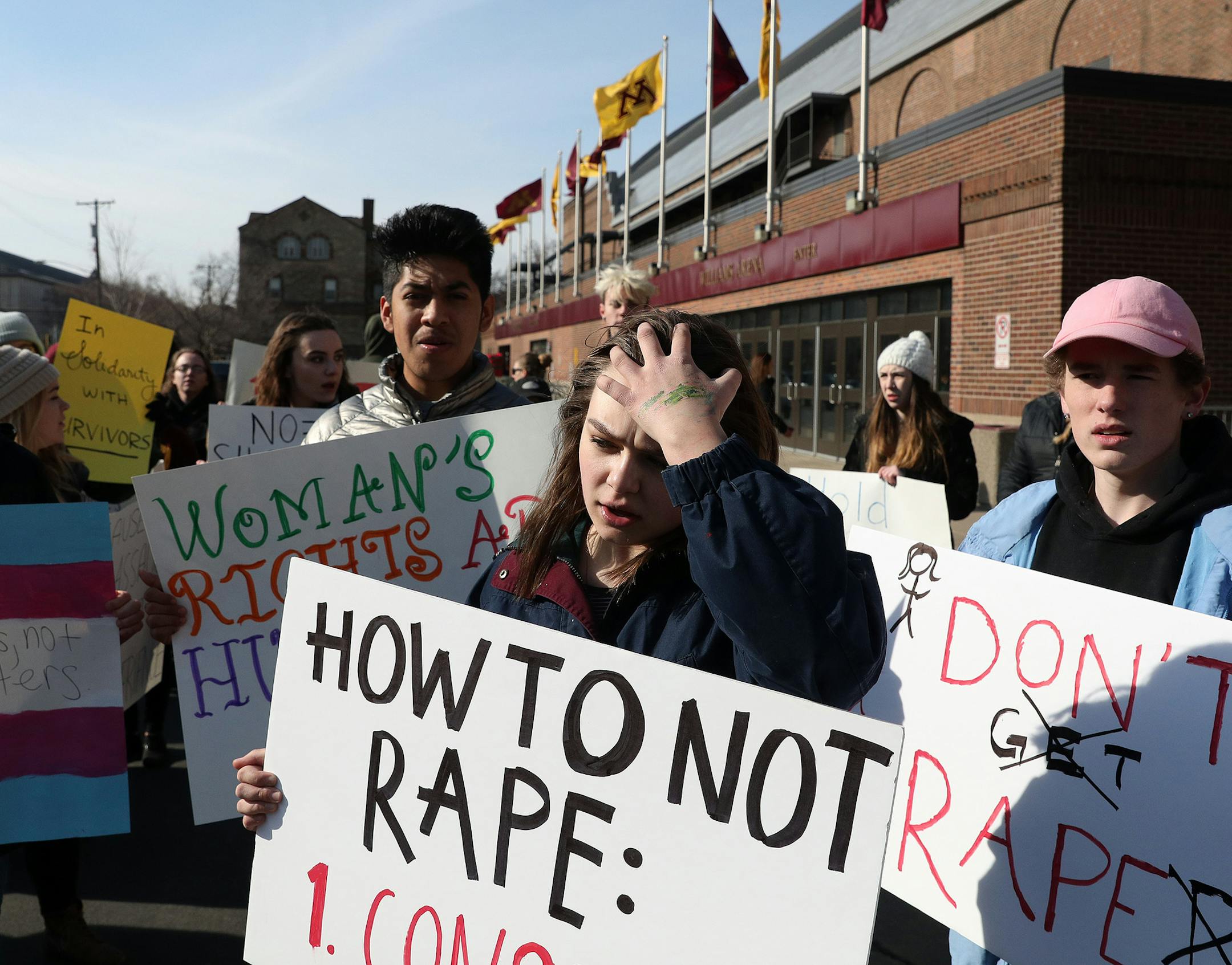 Eleanore Stevenson stood with fellow students, activists, and supports following the march Saturday. ] ANTHONY SOUFFLE ï anthony.souffle@startribune.com University of Minnesota students and activists marched against sexual assault on campus Saturday, March 4, 2017 down University Avenue SE in Minneapolis.