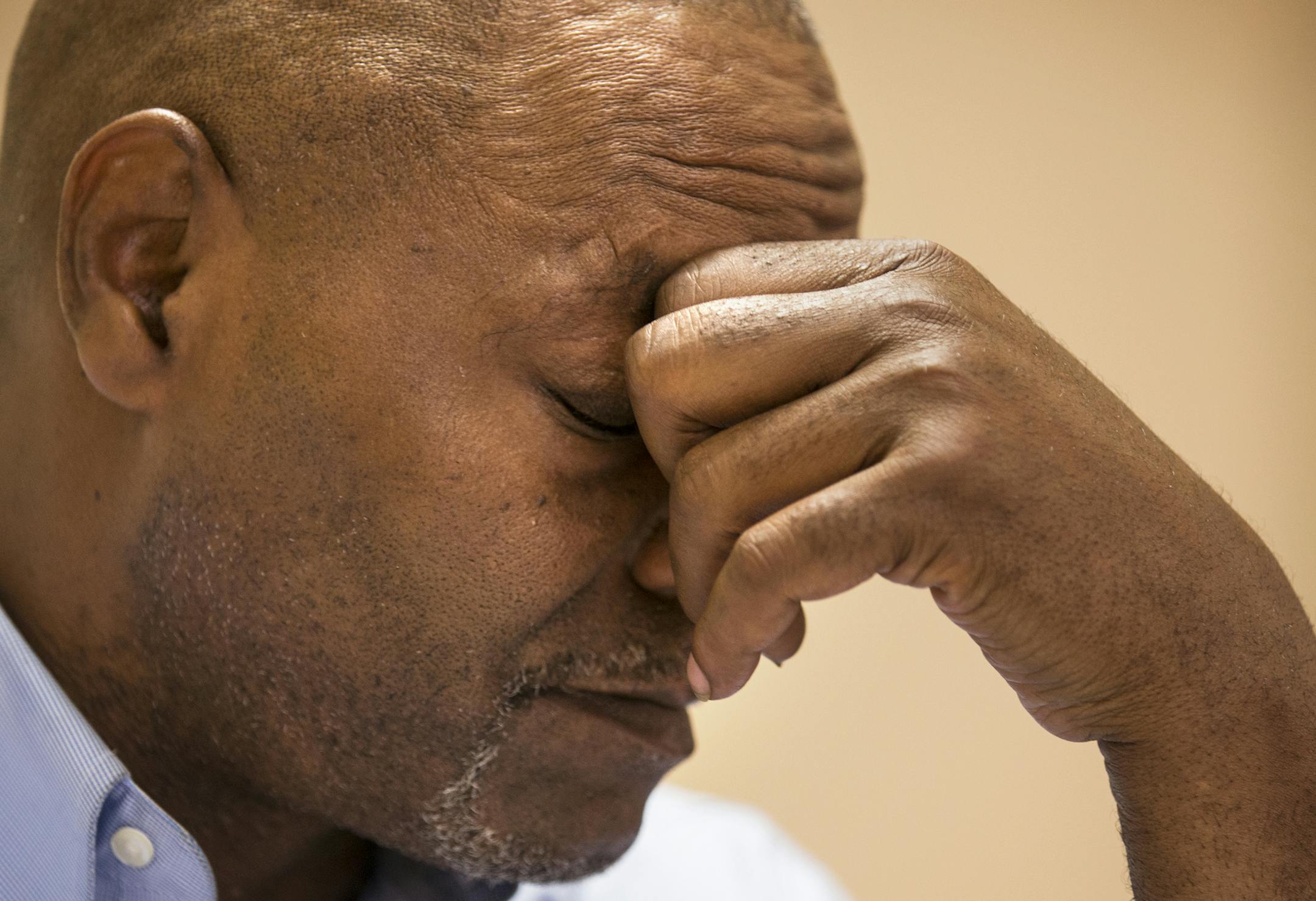 Al Flowers, who suffered injuries during an arrest by Minneapolis Police officers last year, gets emotional during a press conference at the Minneapolis Urban League building in Minneapolis on Thursday, July 16, 2015. ] LEILA NAVIDI leila.navidi@startribune.com / BACKGROUND INFORMATION: Community leaders met with the public and media calling for an overhaul of the Office of Police Conduct Review's response to civilian complaints.