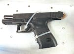 This Glock handgun equipped with a machine gun conversion device, also referred to as a "switch," was found during  Raquan Rahjai Johnson's arrest on 