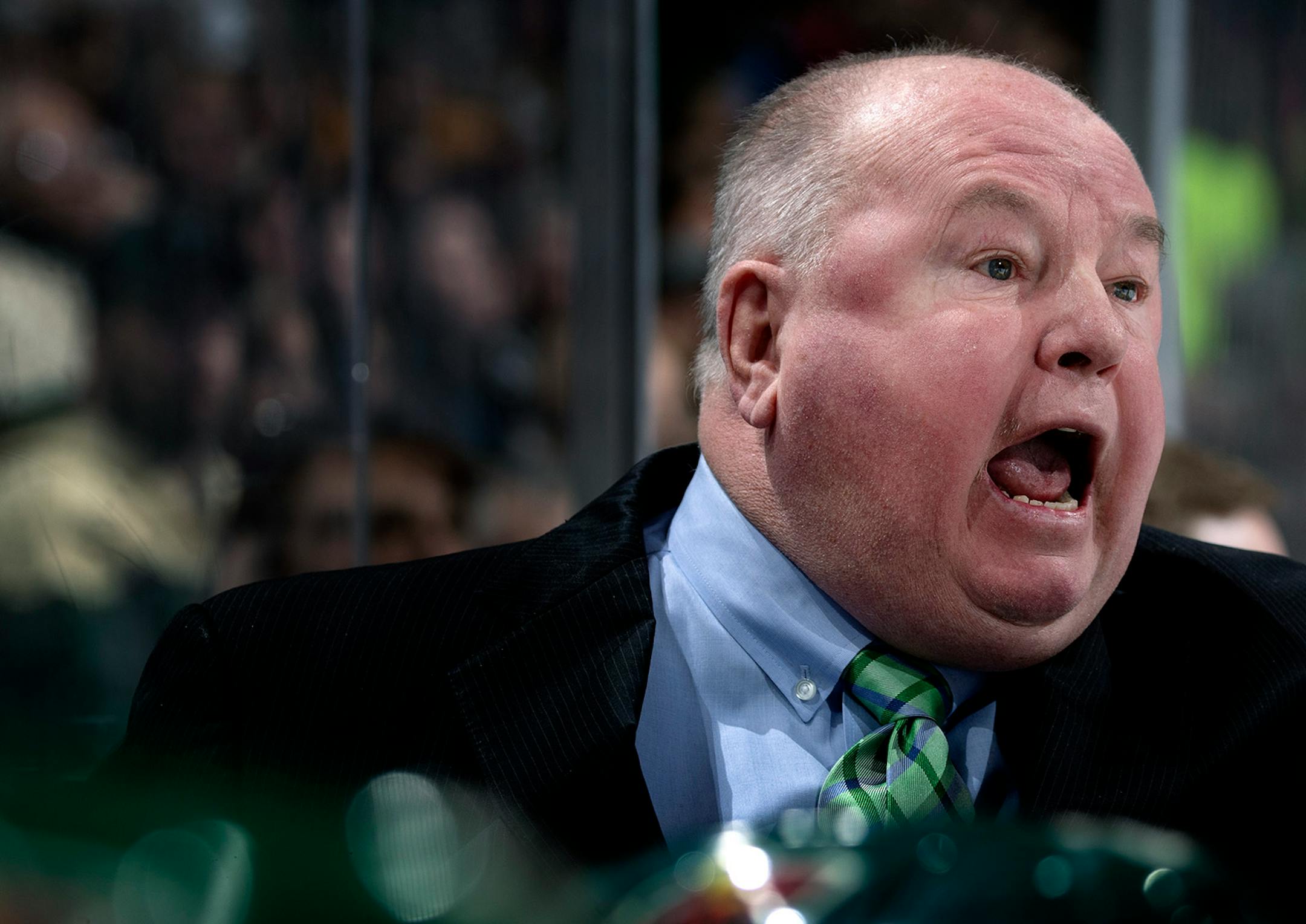 Minnesota Wild head coach Bruce Boudreau disputed a penalty call in the second period.