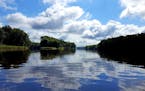 The St. Croix River, which forms a portion of the border between Wisconsin and Minnesota, is part of the St. Croix National Scenic Riverway and is a p