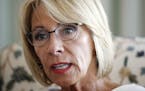Education Secretary Betsy DeVos is interviewed in her office at the Education Department in Washington, Wednesday, Aug. 9, 2017. DeVos is distancing h