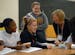 L to R Ninth grade students at Nicollet Jr High Tatiana Smithson-Brown, McKenzie Roades, Kelsey Roades and share a laugh with a mentor Darlene Miller 