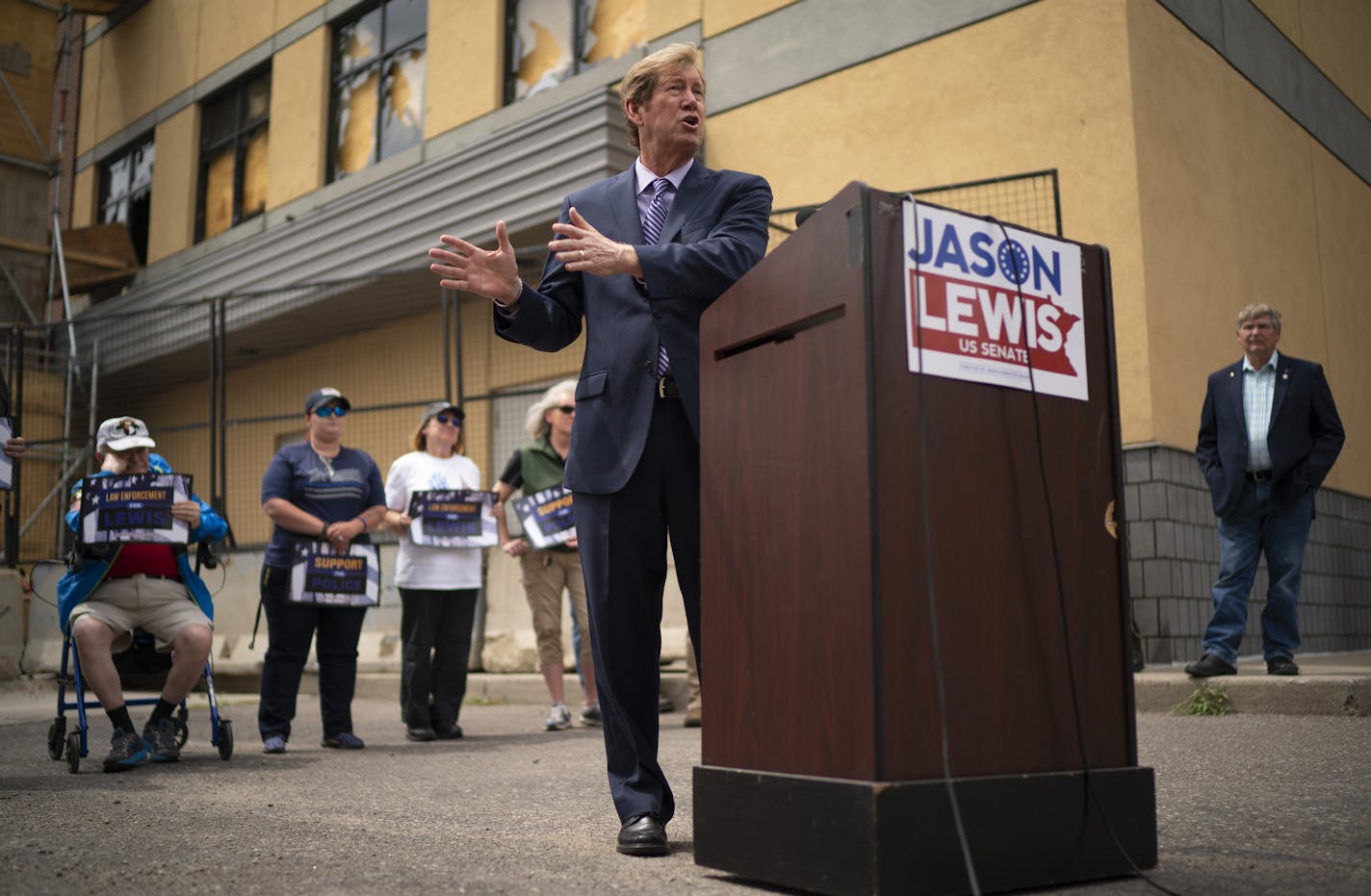 U.S. Senate candidate Jason Lewis spoke at a news conference outside the Third Precinct Police Headquarters in Minneapolis Monday afternoon. ] JEFF WHEELER • Jeff.Wheeler@startribune.com U.S. Senate candidate Jason Lewis held a "Law Enforcement for Lewis" press conference outside the former Third Precinct Police Headquarters in Minneapolis Monday afternoon, June 22, 2020. Lewis was joined by some law enforcement officers, active and retired.