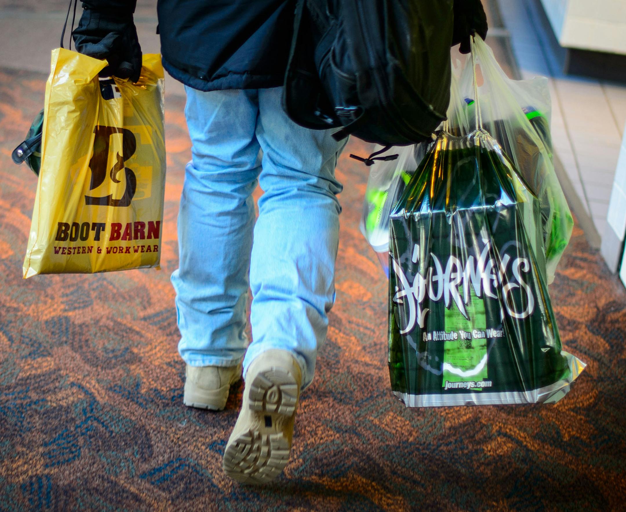 Shoppers at the Mall of America. Some took advantage of school closures due to below zero temperatures. Retail hires had a strong showing in the latest jobs numbers. Thursday, January 23, 2014. ] GLEN STUBBE * gstubbe@startribune.com ORG XMIT: MIN1401231540341614