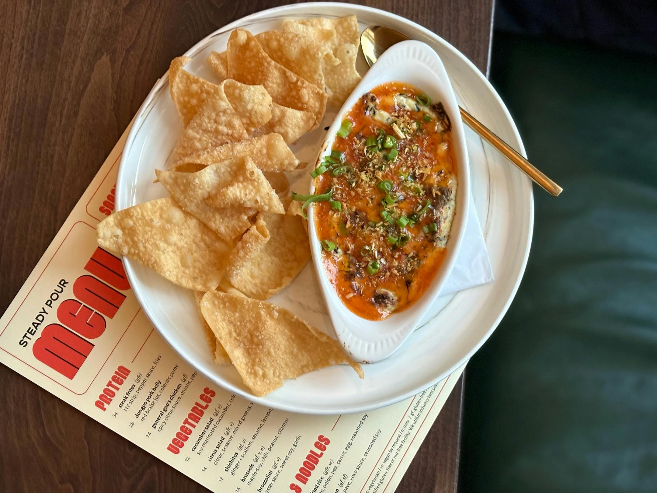 A riff on artichoke dip and the take out classic crab rangoon. Served with wonton wrapper crisps.