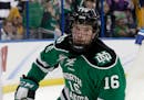 North Dakota forward Brock Boeser (16) celebrates his shorthanded goal against Quinnipiac during the first period of an NCAA Frozen Four championship 