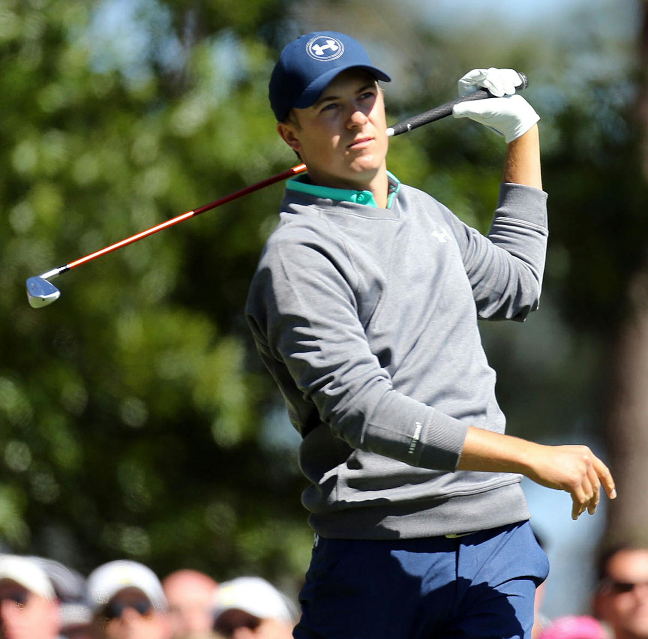 Jordan Spieth reacts to his shot on 4th tee during the third round of the 80th Masters at the Augusta National Golf Club in Augusta, Ga., on Saturday, April 9, 2016. (Curtis Compton/Atlanta Journal-Constitution/TNS)
