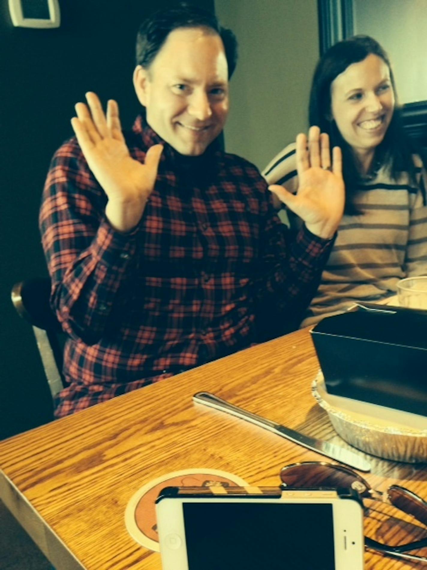 Jason DeRusha with clean hands -- as a result of ignoring his phone (in foreground), while lunching with his wife & kids at Red Cow.