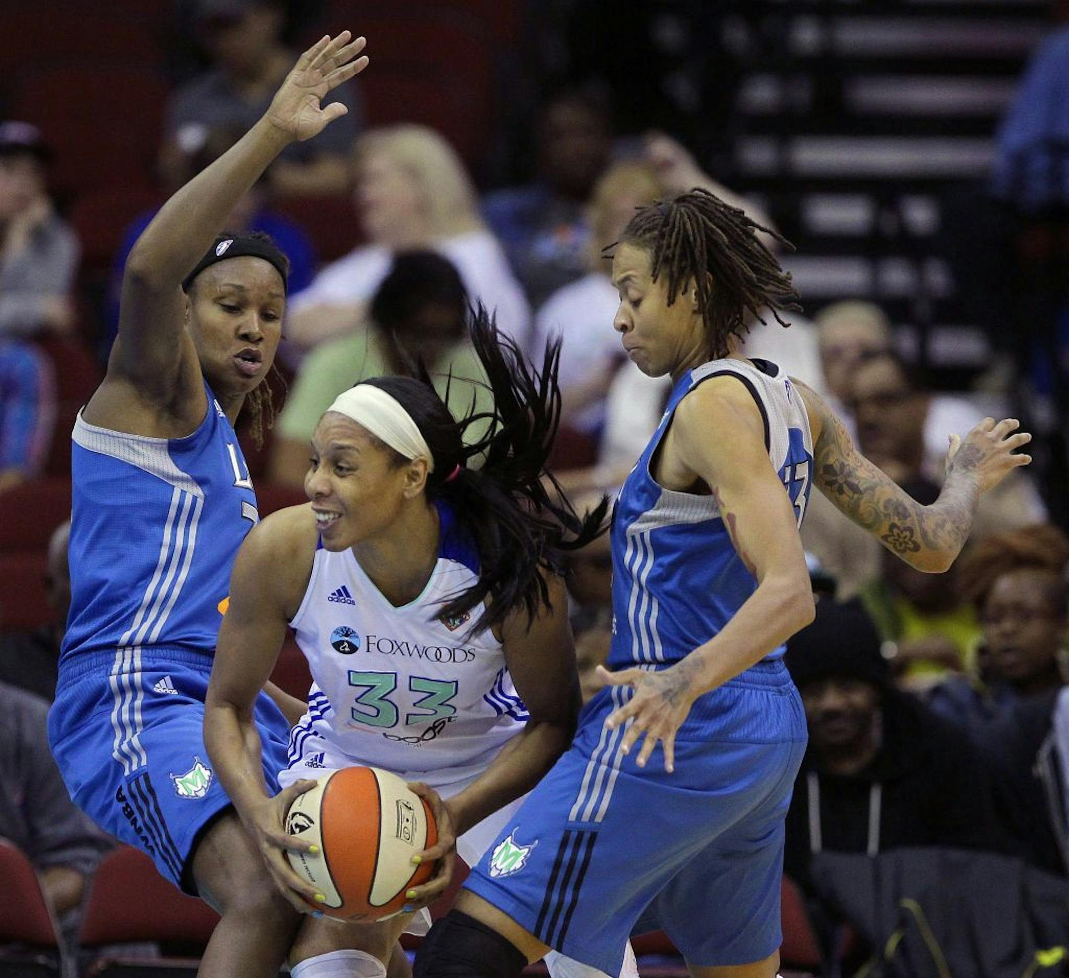 Seimone Augustus, right