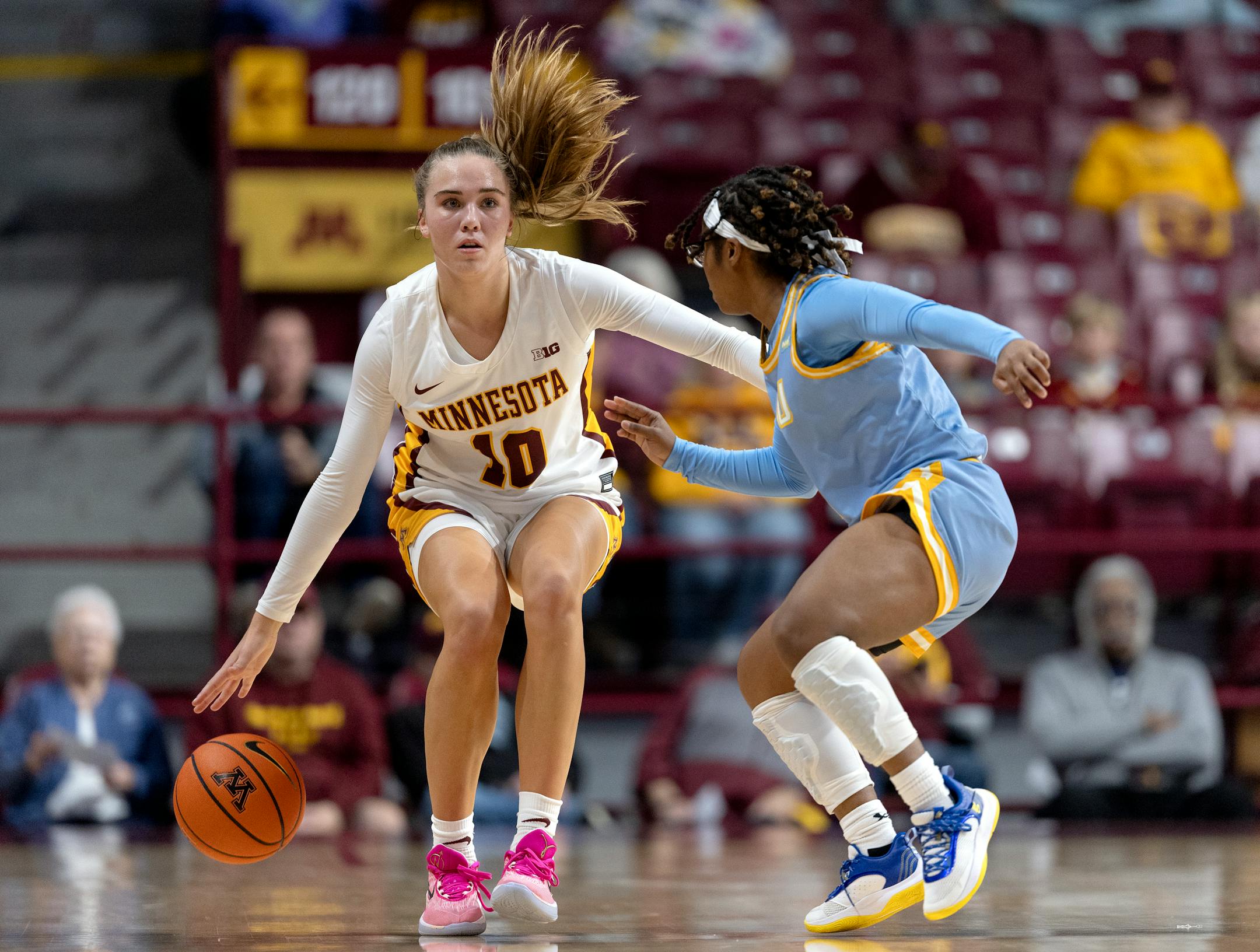 Mara Braun (10) of Minnesota dribbles up the court in the second quarter Wednesday, November 8, 2023, at Williams Arena in Minneapolis, Minn. ] CARLOS GONZALEZ • carlos.gonzalez@startribune.com