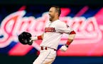 Cleveland's Jason Kipnis celebrated after hitting the winning single off Twins closer Brandon Kintzler during the 10th inning Monday for a 1-0 Indians